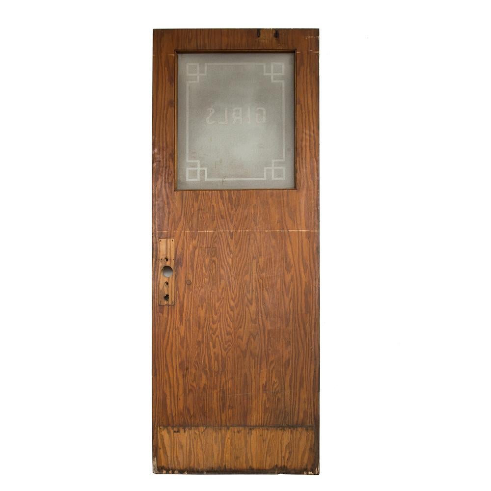 The deco is in the details on this late 1930s school restroom door. The etched glass reads “Girls” with a snappy geometric border while the simple solid oak construction does away with any fussy pretense. A great institutional salvage piece.