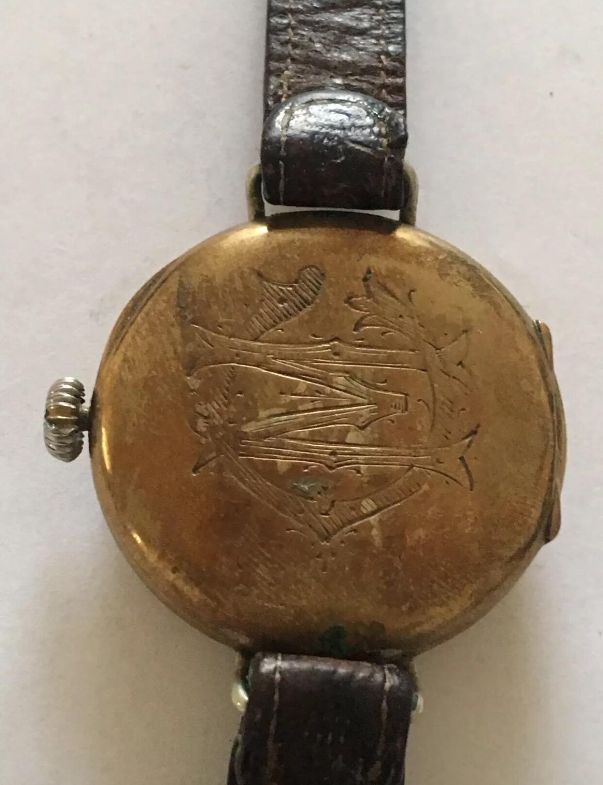 
1930’s Gold Plated Swiss Made Trench / Wristwatch.


This charming trench watch is working and ticking nicely but I cannot guarantee the time accuracy.  Visible cracks on the dial, old leather strap and buckle has some wear.