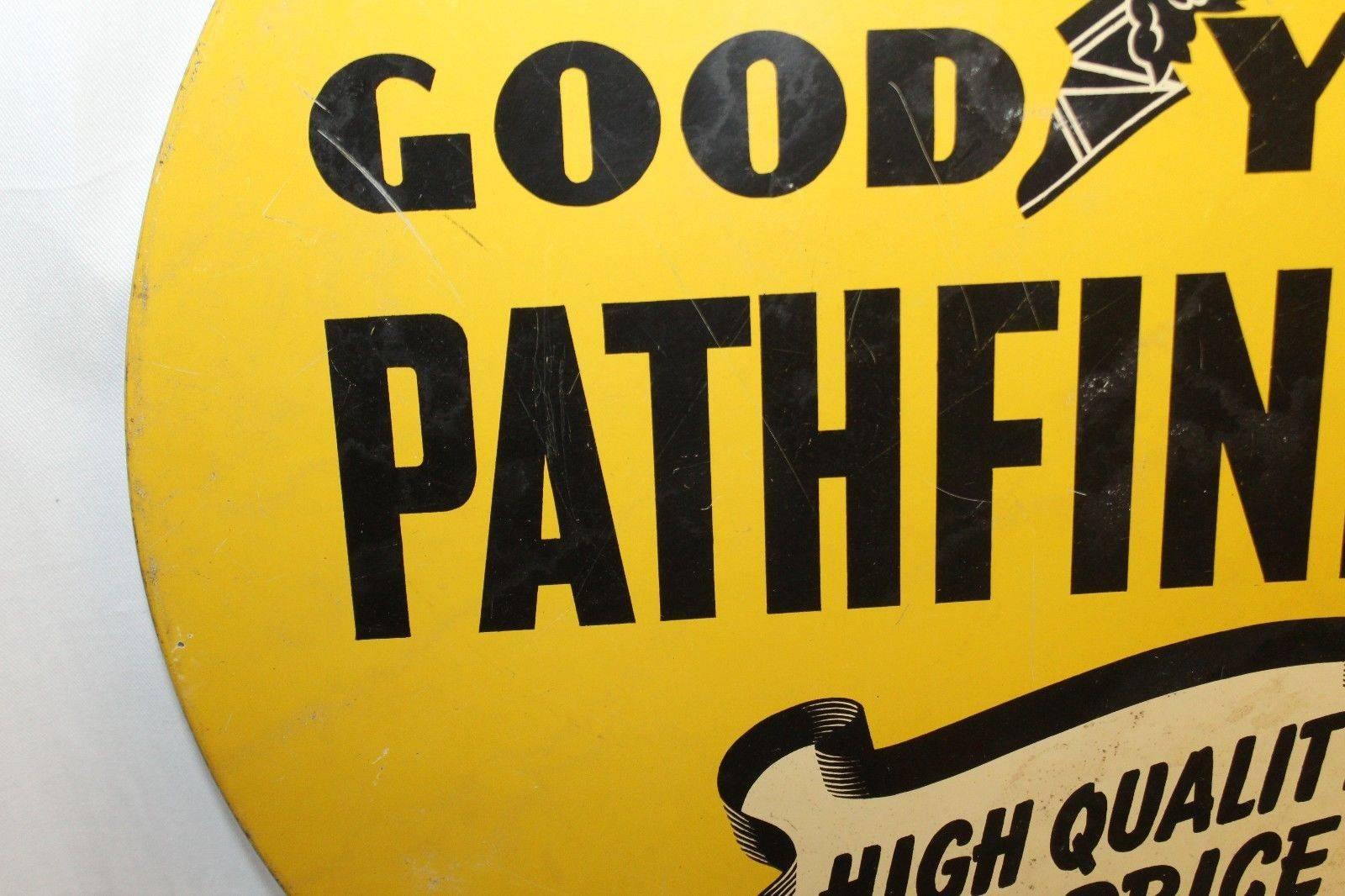 antique goodyear tire signs