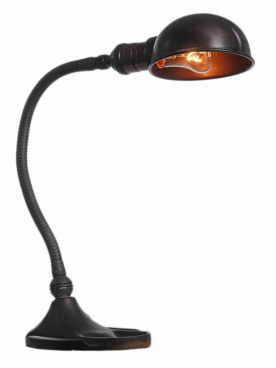 This is a nice size desk lamp. Not too big so it takes over the desk. The line are clean and simple with a gooseneck arm molded cast iron base and a brass shade. We rewired the lamp with an antique style black fabric covered twisted cord. Also the