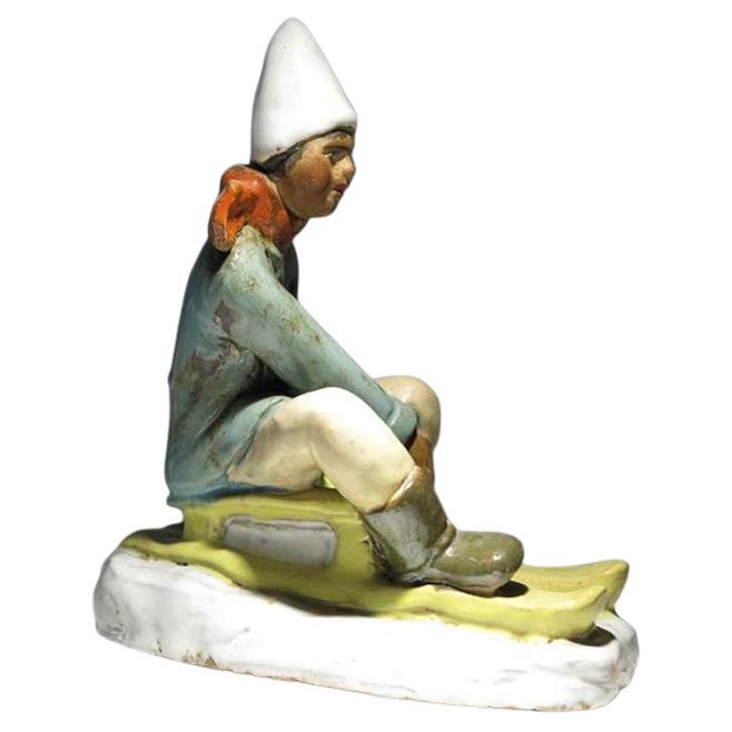 1930s Gorgeous Boy with Sledding Sculpture by Cséfalvay For Sale