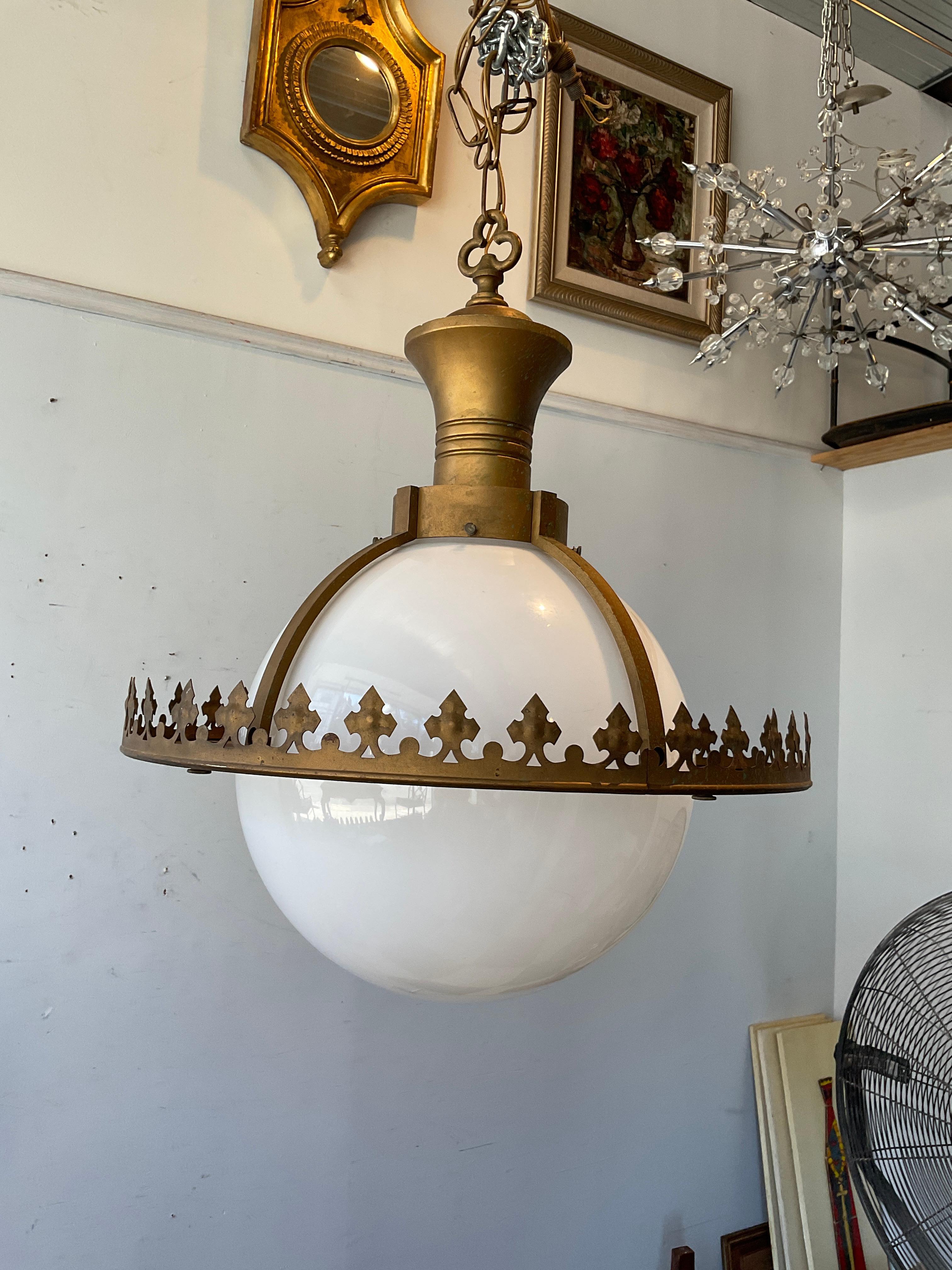 1930s Gothic chandelier. Glass globe, iron frame. Hung in the entryway of a local mansion.
Needs rewiring.