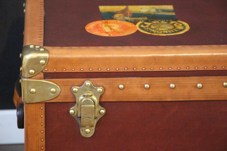 This magnificent Goyard shoe trunk features the very unusual burgundy red canvas, Goyard stamped solid brass locks, as well as brass studs and large leather side handles. It still has got its original Goyard plaques on both sides. It also has a very