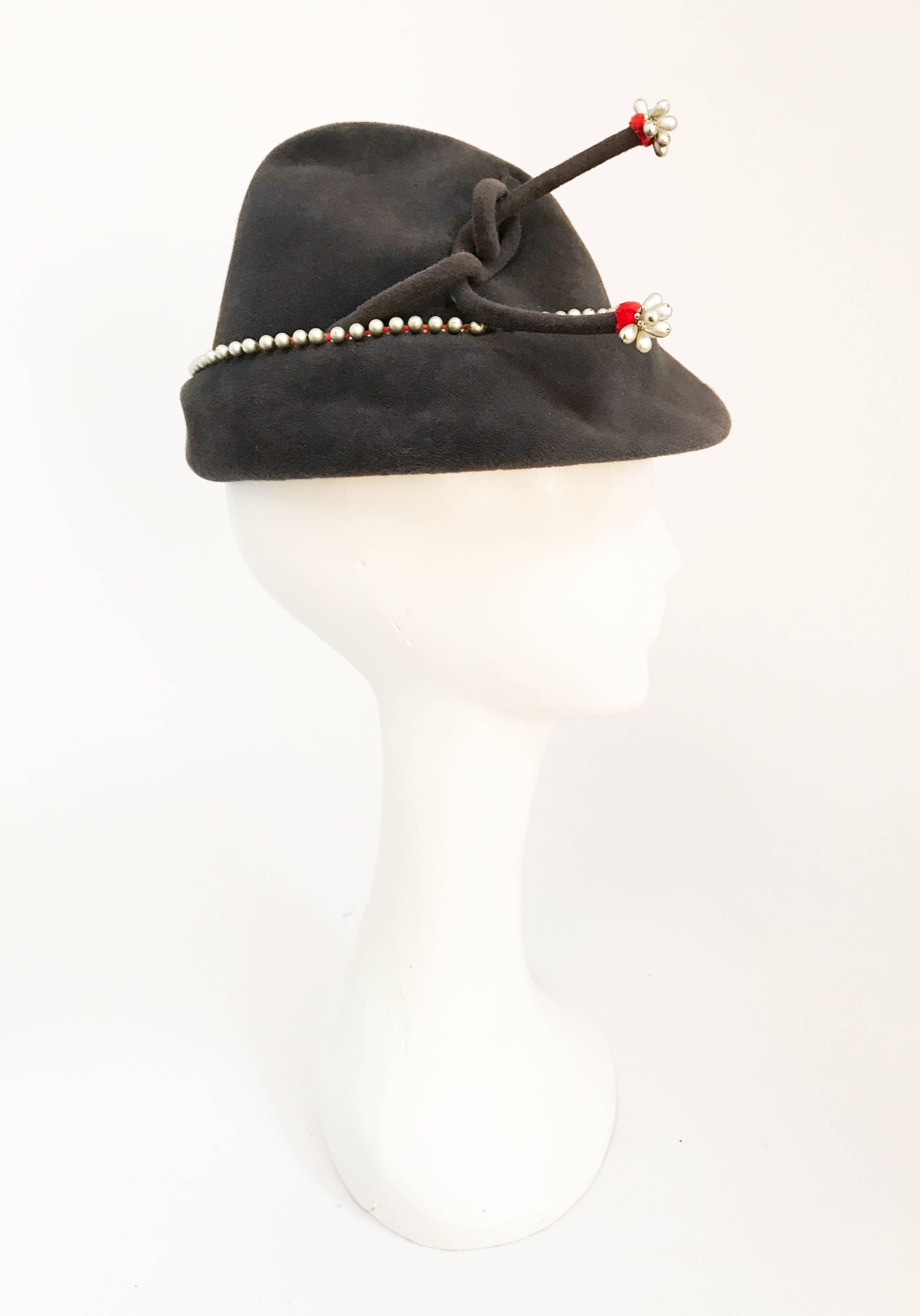 1930s Grey Wool Fur Felt Hat with Pearl and Velvet Accents. Handmade grey fur felt hat with pearl accents and coral-tone velvet accents. Heavily inspired design by 1930's movie Robin Hood.   22 inch circumference (Medium).