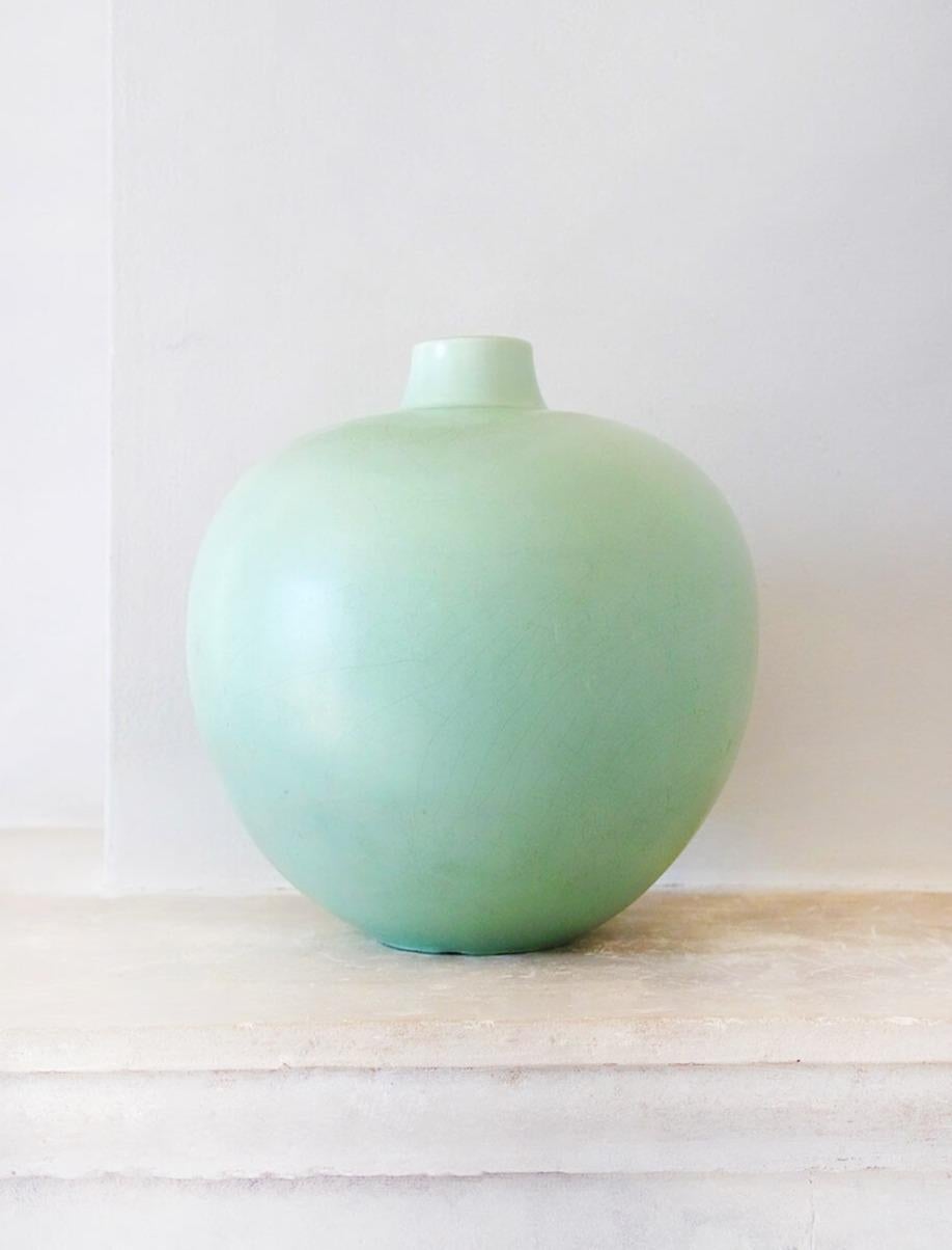This spectacular large celadon vase was designed by Guido Andlovitz for the ceramics house, Società Ceramica Italiana, Lavenia where he was the Art Director in the 1930s. Guido Andlovitz (1900-1971) was a renowned Italian ceramicist whose work is