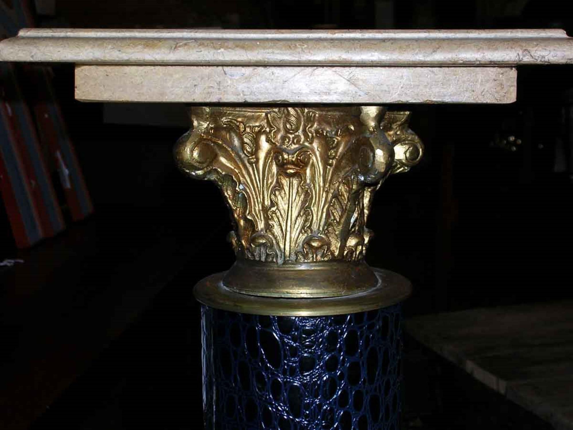 Early 20th Century hand carved ornate square marble pedestal decorated with various bronze appliques such as these imaginative ferns and a Corinthian capital. This can be seen at our 400 Gilligan St location in Scranton, PA.