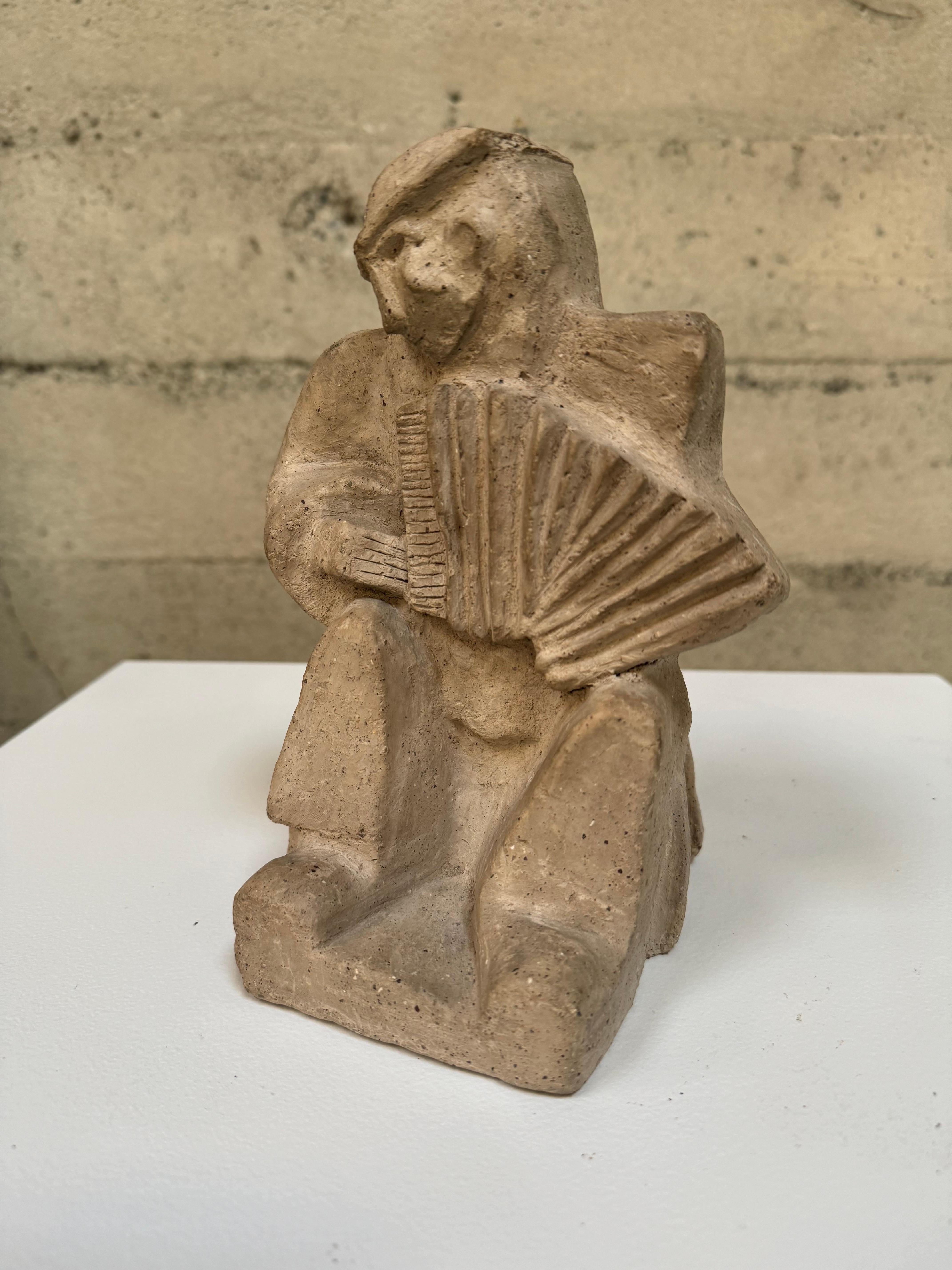 Hand-Carved Art Deco / Cubist Jan & Joel Martel Style Cast Stone Accordion Player Sculpture  For Sale