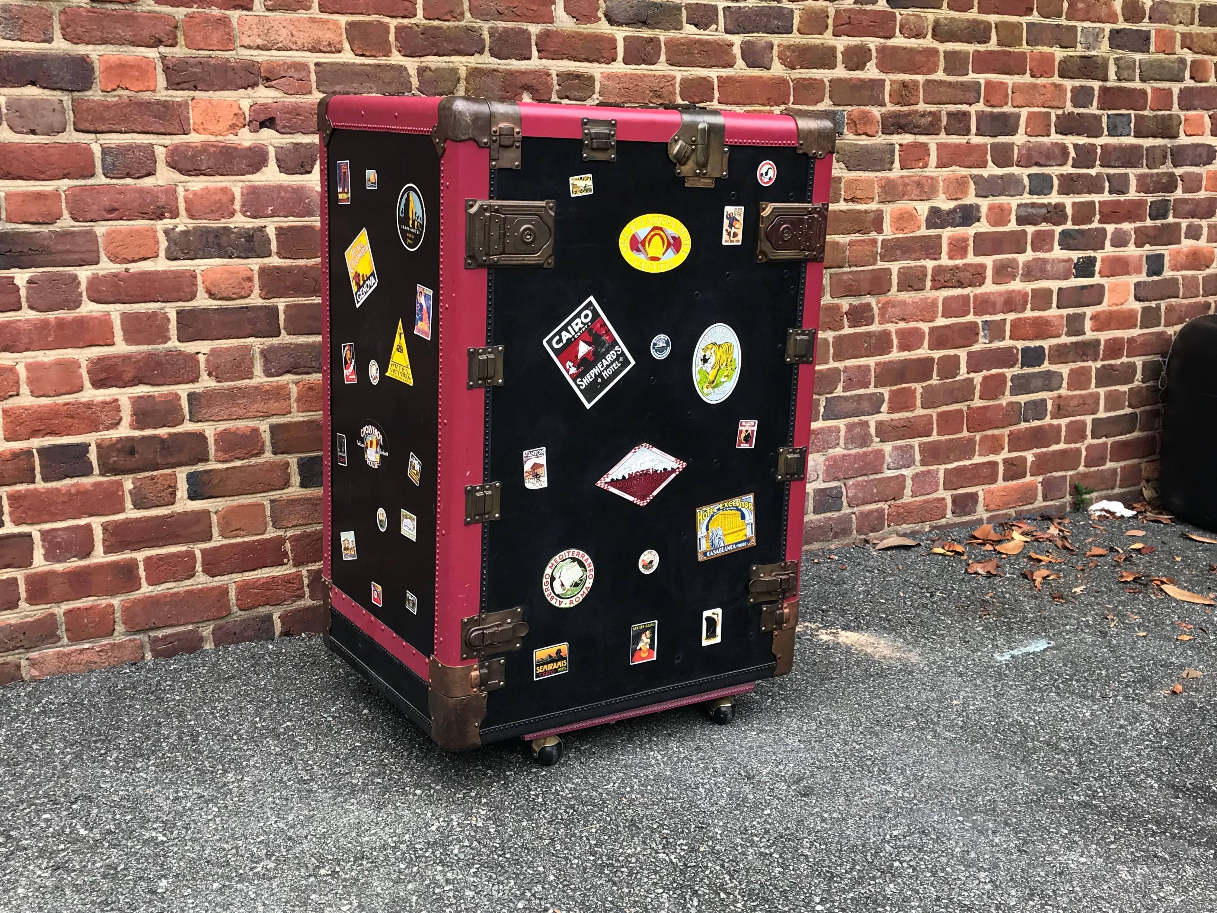 Offered is a gorgeous, 1930s Hartmann Trunk Co. turn table leather steamer wardrobe trunk, from the Pathfinder collection for Saks Fifth Avenue. Left side opens to hanging bar. Right side opens to drawers. Exterior has been covered in stickers from