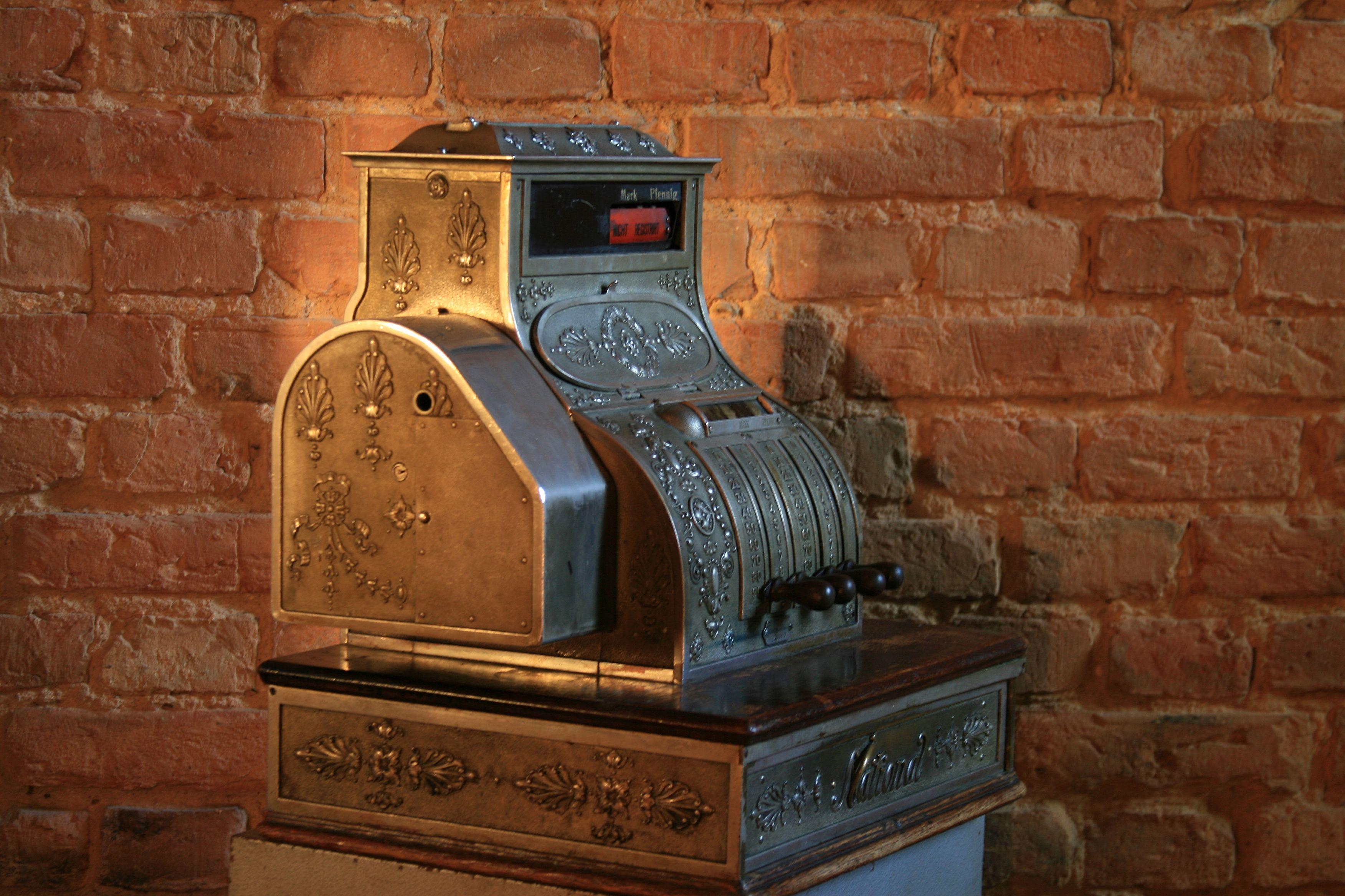 German National store cash register from the 1930s.
Construction:
The cash register's casing is made of a steel cast covered with a layer of chrome. The basis is a wooden chest with a cash drawer in it.
The offered cash register does not meet its