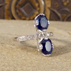 1930s Horizontal Two-Stone Sapphire Ring with Half Diamond Set Platinum Band