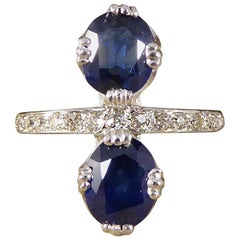 1930s Horizontal Two-Stone Sapphire Ring with Half Diamond Set Platinum Band
