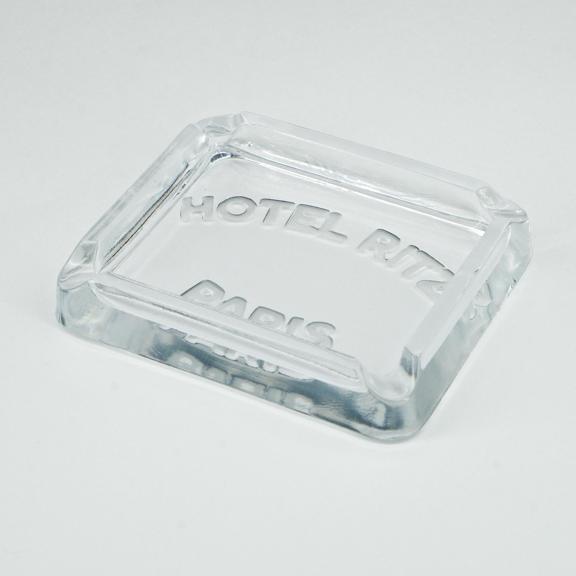 A wonderful and rare mold glass ashtray souvenir from the 1930s-1940s produced for and only found at the Hotel Ritz in Paris at that time. A chic tabletop accessory that might imply you were at the world's best hotel over 75 years ago. 4 1/8 by 3