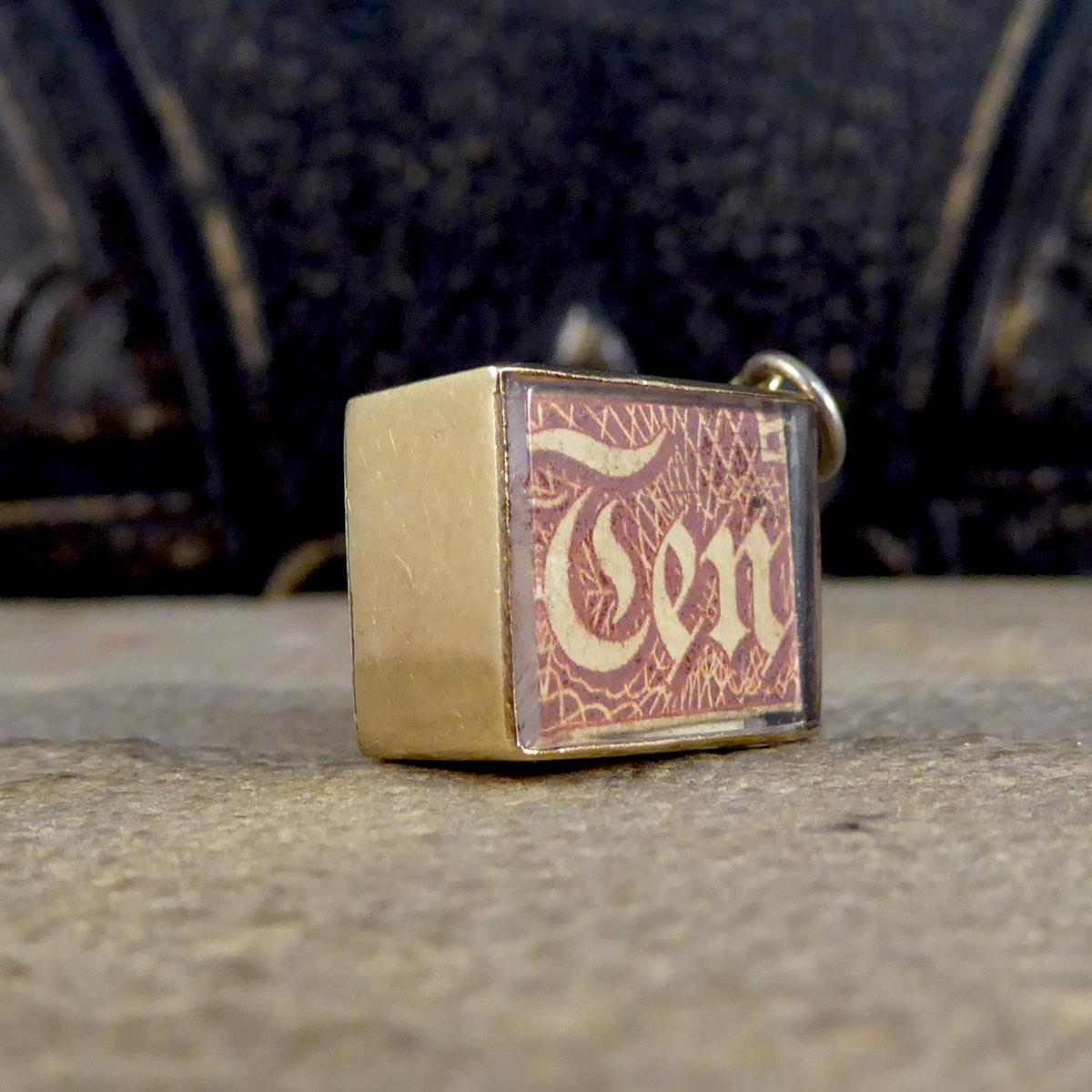 Such a lovely little 9ct Yellow Gold Art Deco Charm that holds a ten shilling note, and is engraved 
