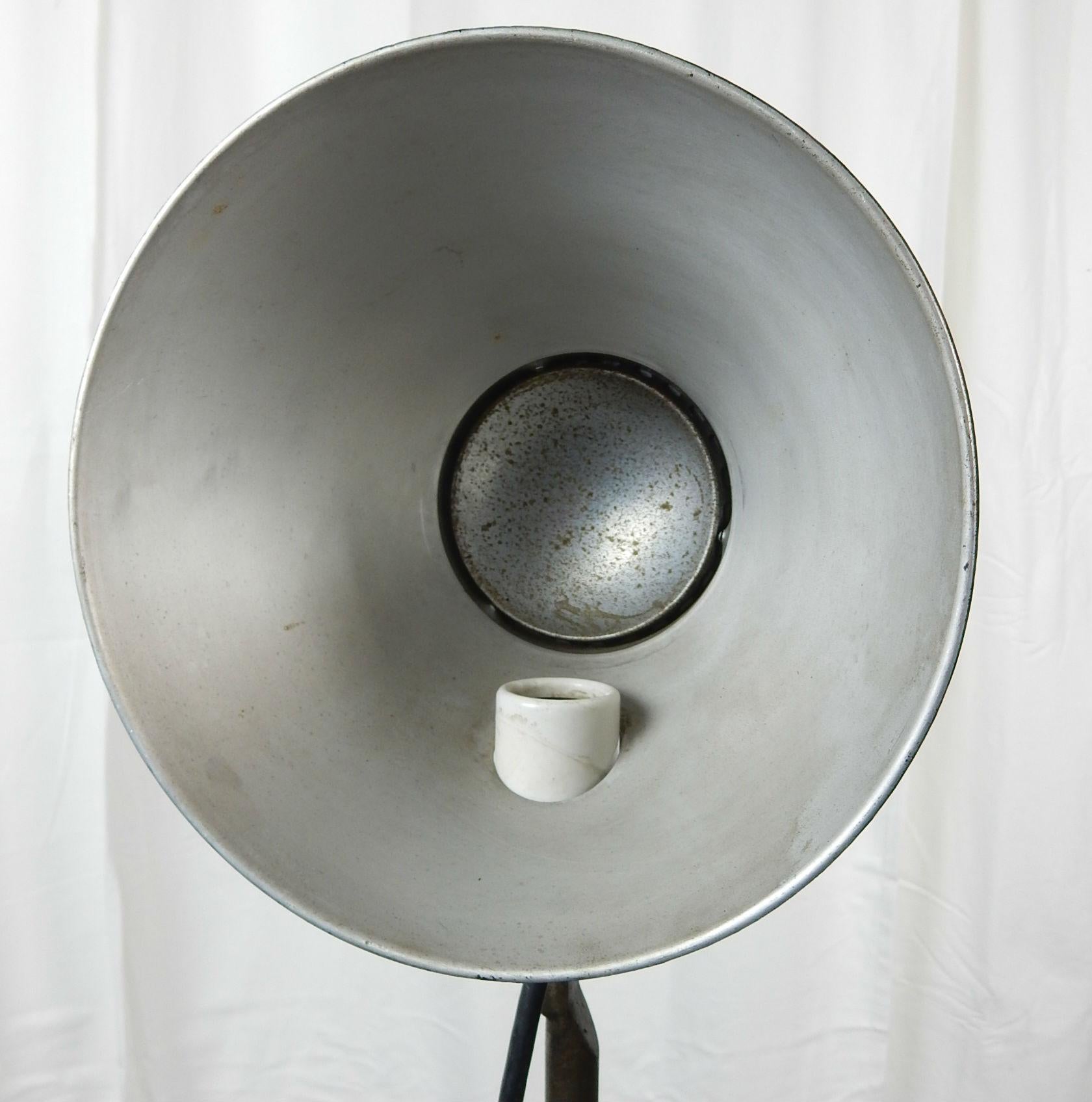 Mid-20th Century Pair of 1930s Industrial Machine Age Adjustable Tri-Pod Spot Floor Lamps
