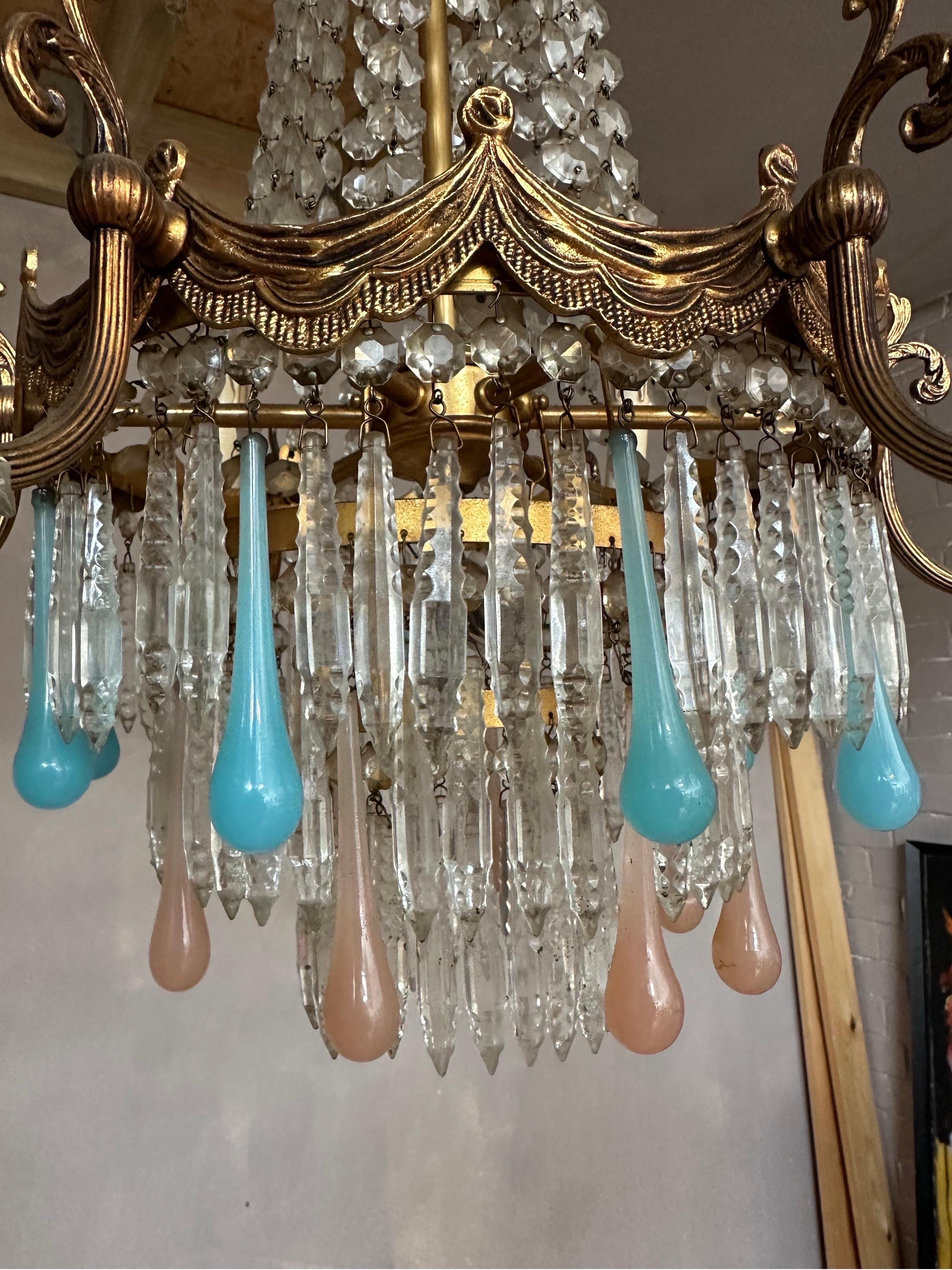 A beautiful petite Murano chandelier with cut crystal and colourful drops. 