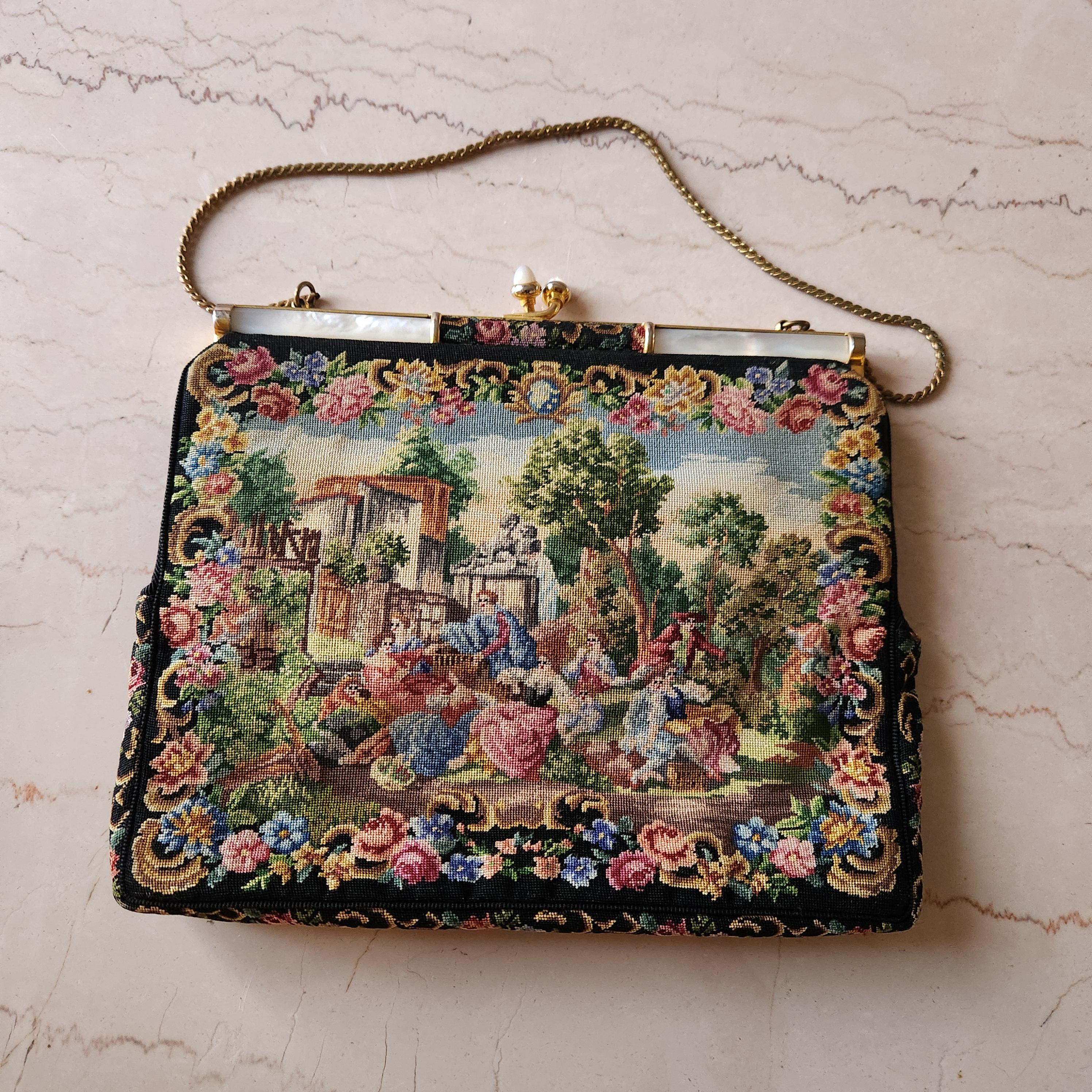 AMBIANIC presents
Italian Petit Point Evening Bag with Mother of Pearl and Gold Tone Hardware
Fine needlepoint hand-stitched scenic tapestry embroidery
stamped made in Italy
gold carry chain
silk interior
2 interior side pockets
8w x 7 h 1
