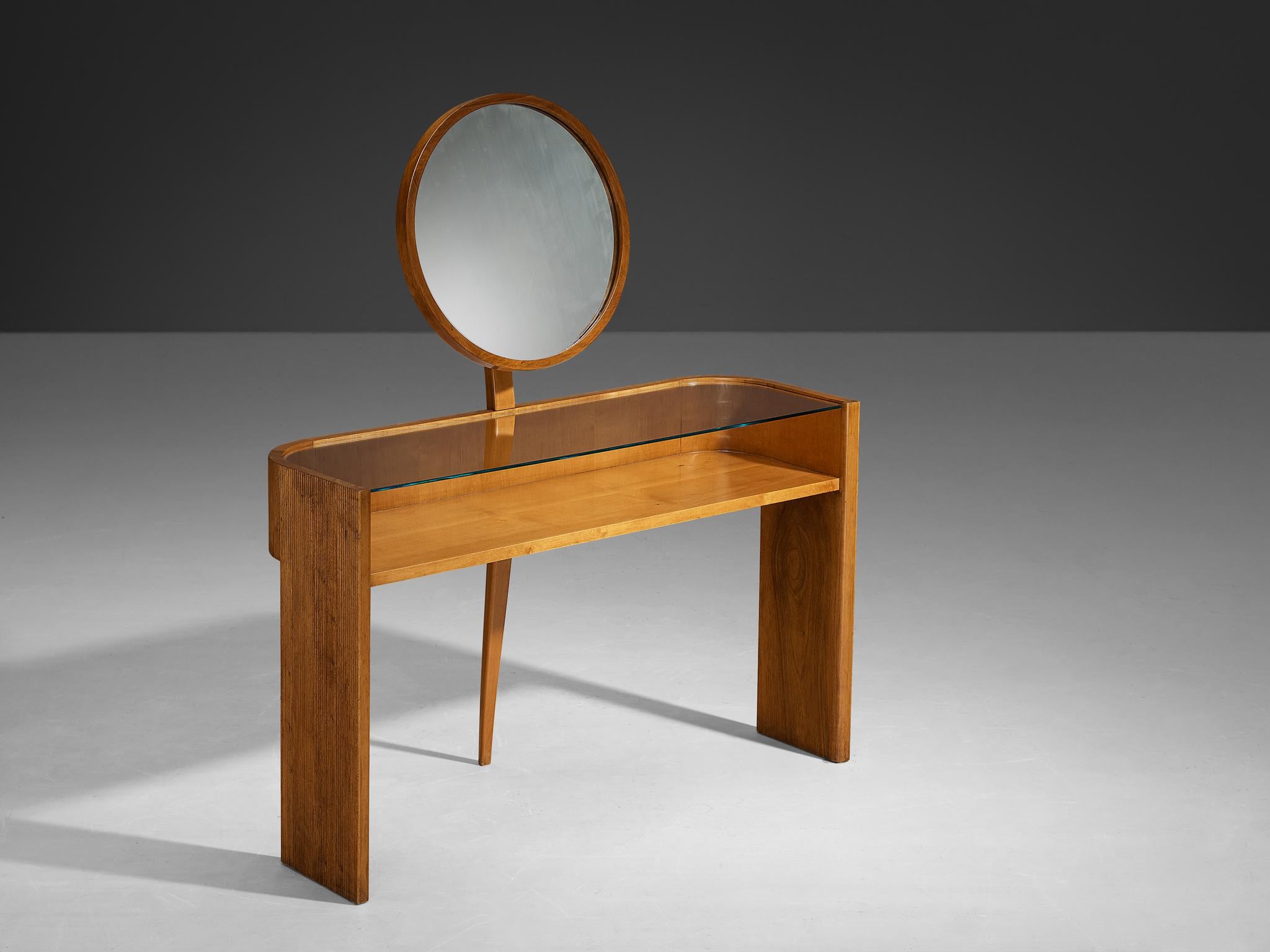 Vanity table, walnut, mirrored glass, brass, Italy, 1930s

Made in Italy, this vanity table is designed according to the Art Deco design principles that were in vogue in the thirties. The dressing table bears witness to the designer's excellent