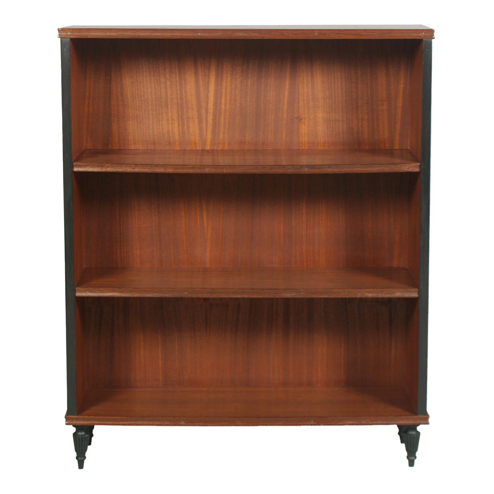 1930s Italy, Mid-Century Modern, Art Deco bookcase in walnut and mahogany wax-polished.
Measures cm: H 128, W 105, D 30.