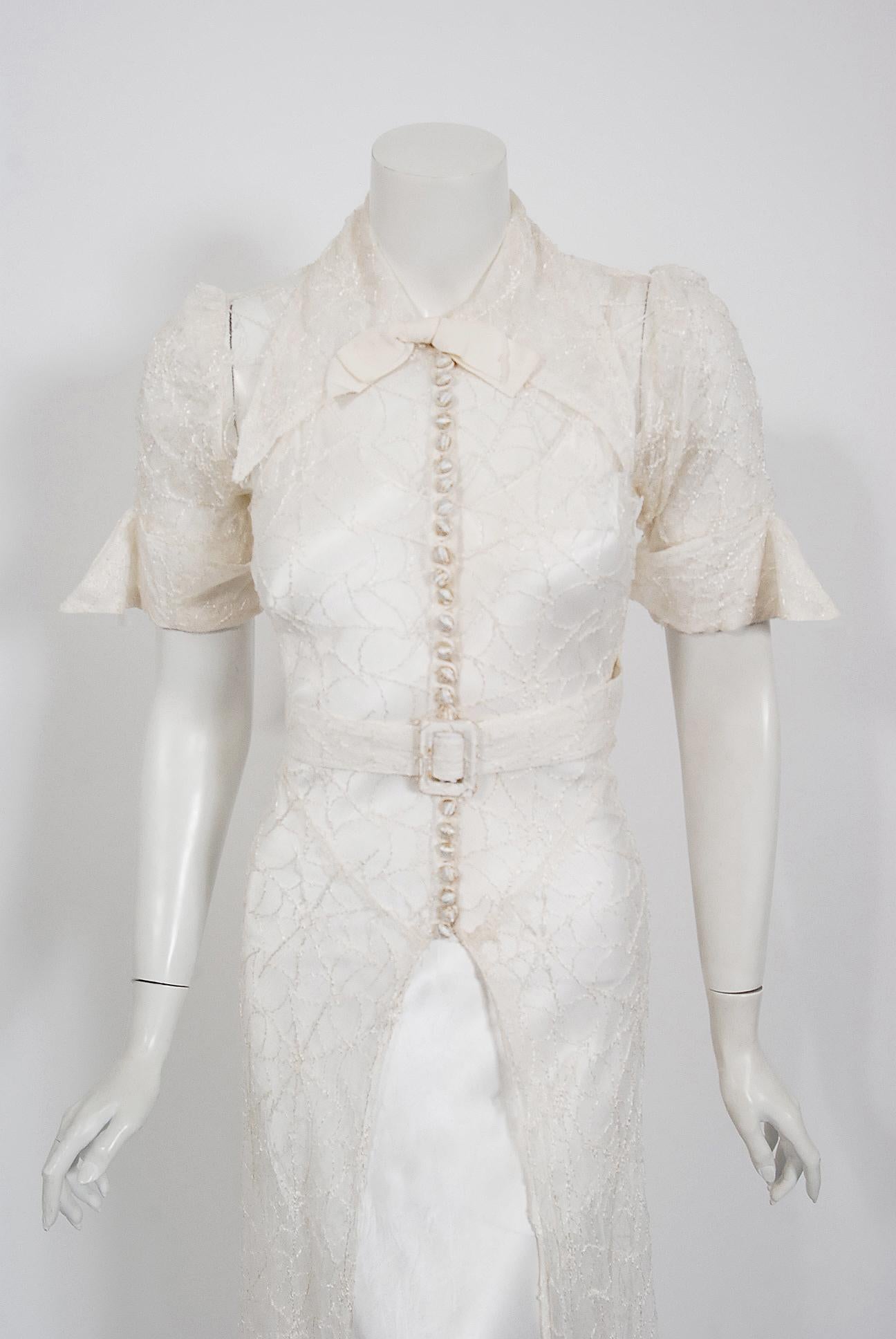 A seductive and sweet 1930's ivory spiderweb lace ensemble from the 