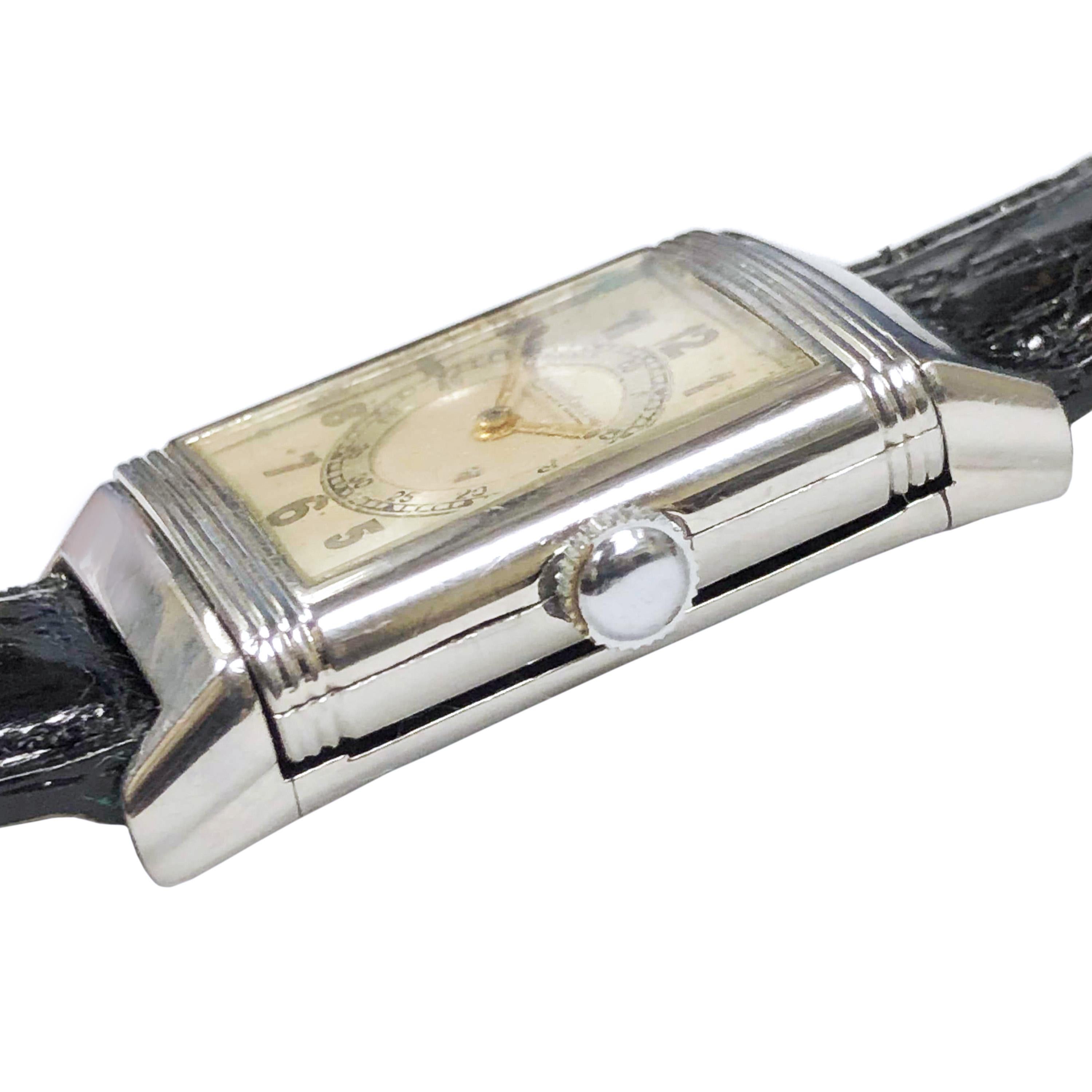 Circa 1930s Jaeger LeCoultre Reverso Wrist watch, 37 X 23 MM Stainless Steel Case that has never been engraved. 15 Jewel Mechanical, Manual wind movement. Original silvered dial with Luminous numbers. Black Crocodile Strap. A very fine example of an