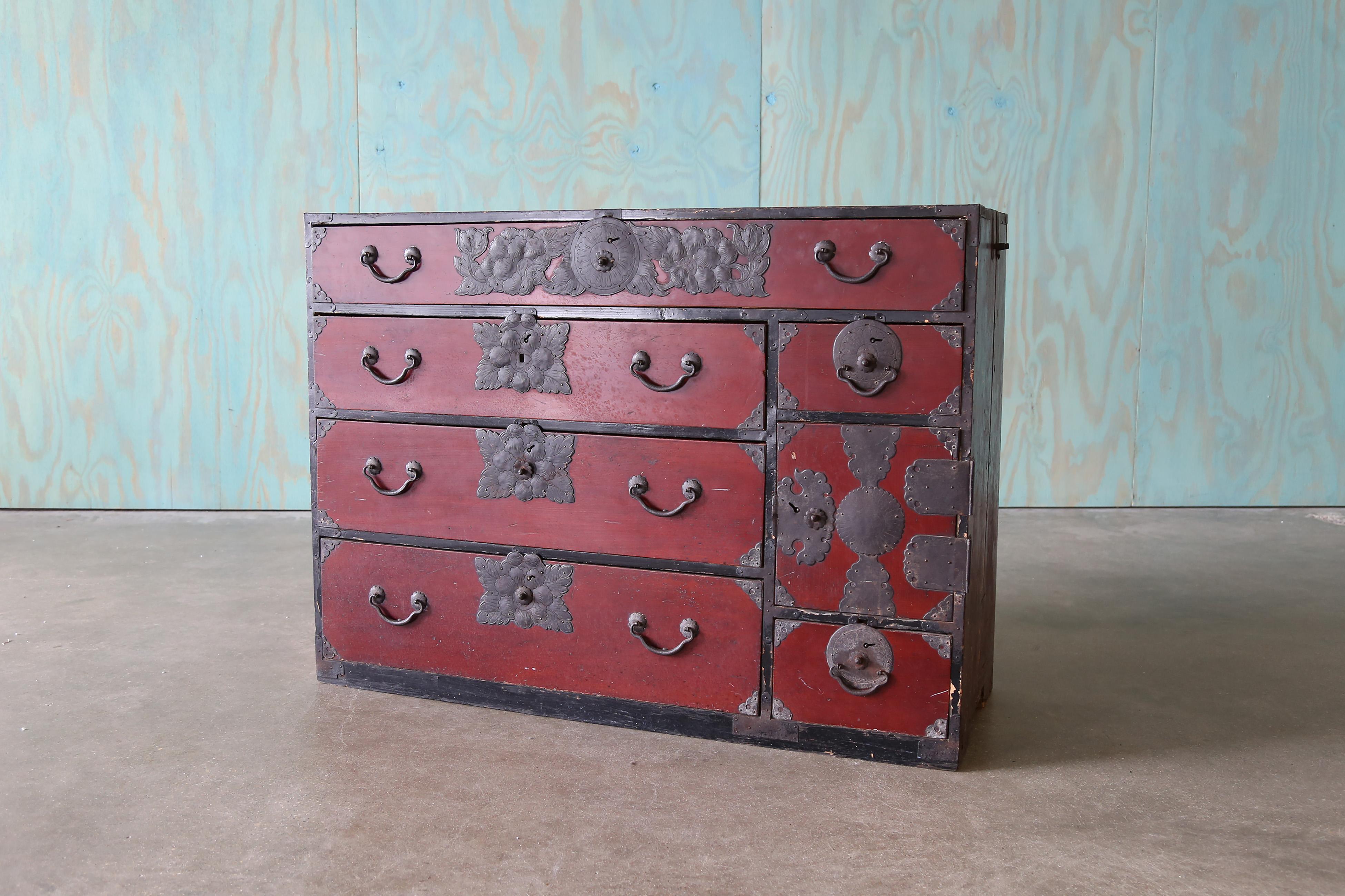A 1930s Japanese lacquer Sendai Tansu Chest of drawers.  Looks to be solid pine construction with a lacquered finish.  Heavy patina adds to the charm. An almost 100 year old piece thats travelled the world and sure to add character and strike a