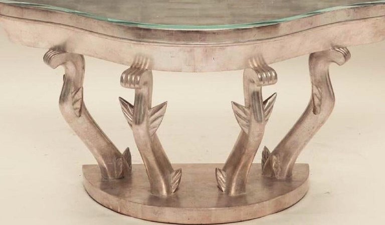 Late 20th century Art Deco silver giltwood console by Anthony R. J. Powell 

With plate glass top, label to the underside inscribed Anthony R. J. Powell Sharbot Lake, Ont.
