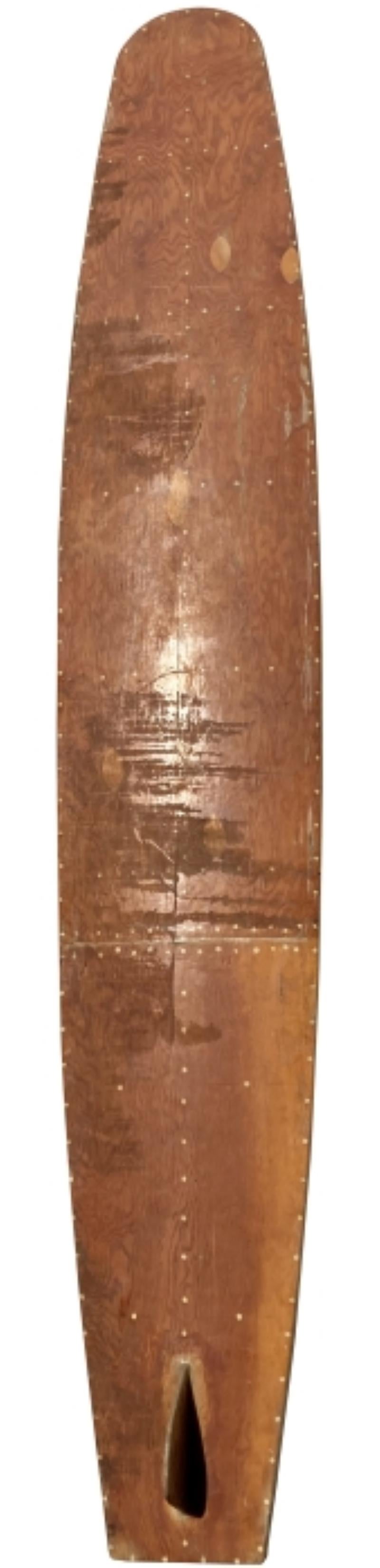 Late-1930s KookBox hollow wood surfboard. Purchased initially by a WWII veteran stationed at Pearl Harbor, Hawaii who was later killed in action during the war. Upon his death, the soldier's belongings, along with this surfboard was mailed from