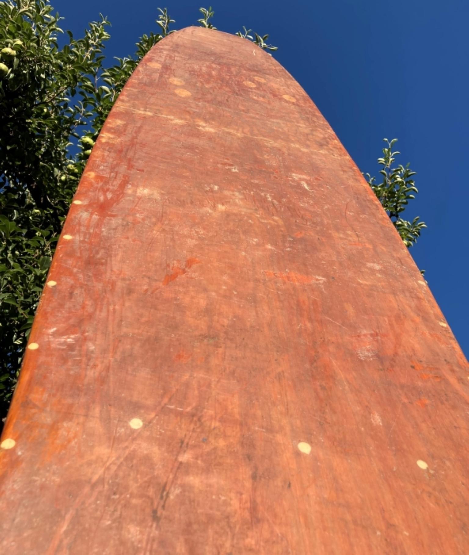 antique wooden surfboard