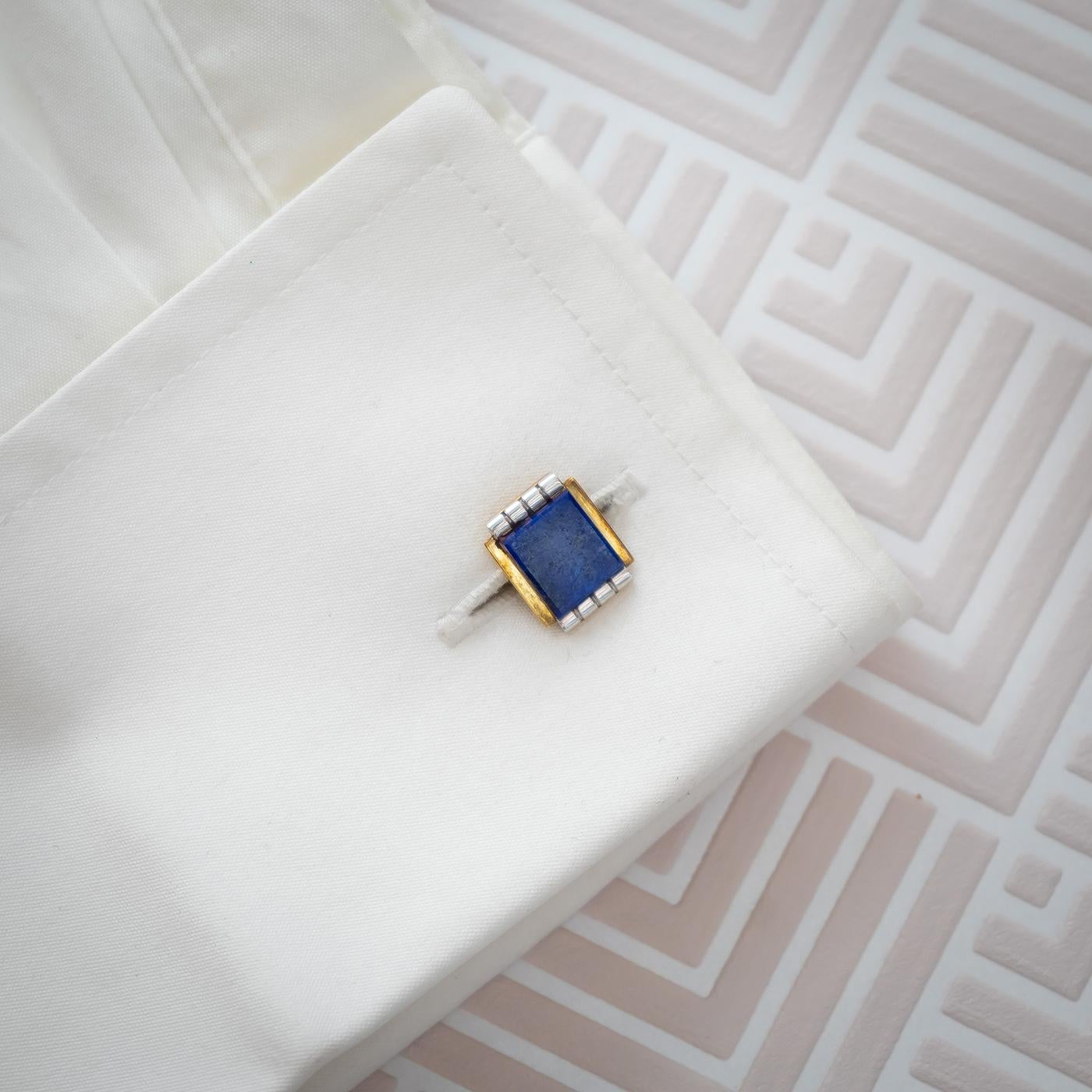 A pair of Art Deco lapis lazuli set cufflinks, mounted in yellow and white gold.  circa 1935