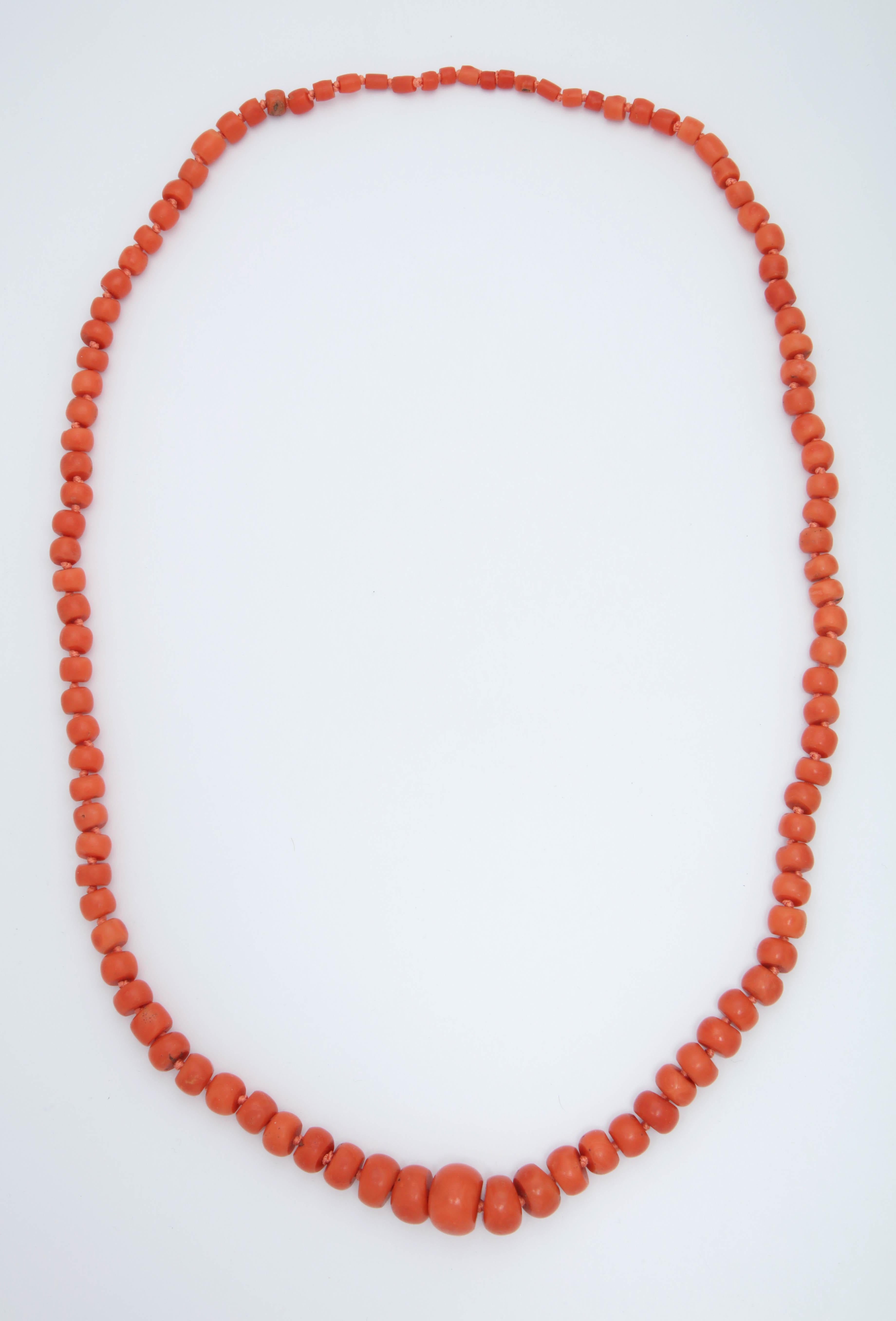 One Ladies Large Coral Necklace Consisting Of 600 Carats Of Natural Color Very Smooth Coral Beads. Total Length 34 Inches.NOTE: Necklace Has Been Restrung With A Double Knotting For Extra Security.