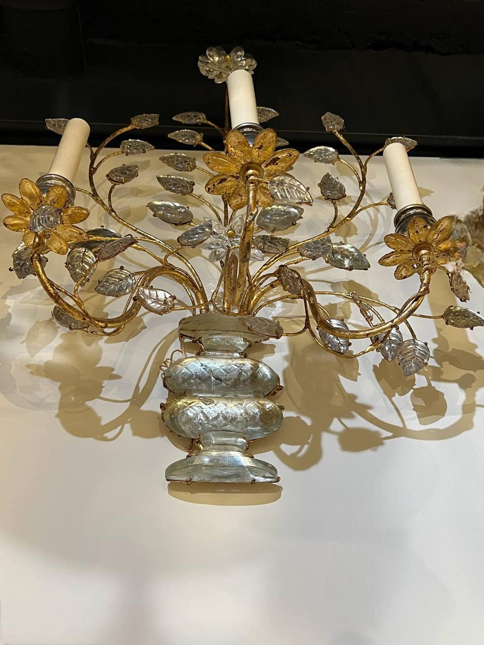 A pair of circa 1930's Large French Bagues gilt metal sconces with cut glass body and leaves.