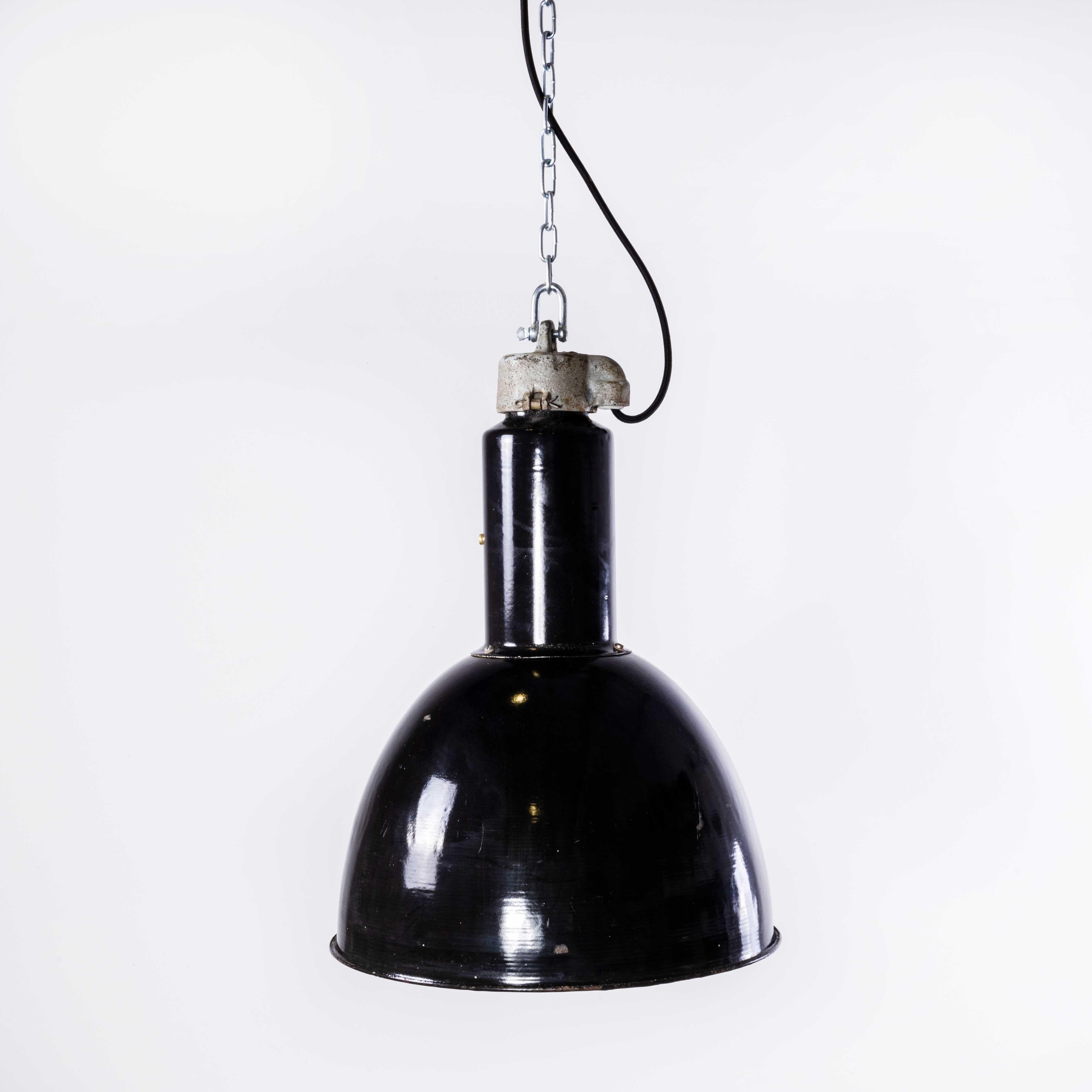 1930’s Large Industrial Black Enamel Bauhaus Ceiling Pendant Lamp
1930’s Large Industrial Black Enamel Bauhaus Ceiling Pendant Lamp. The key feature of these lamps is their heavy steel construction and cast metal tops. Each lamp has been cleaned and