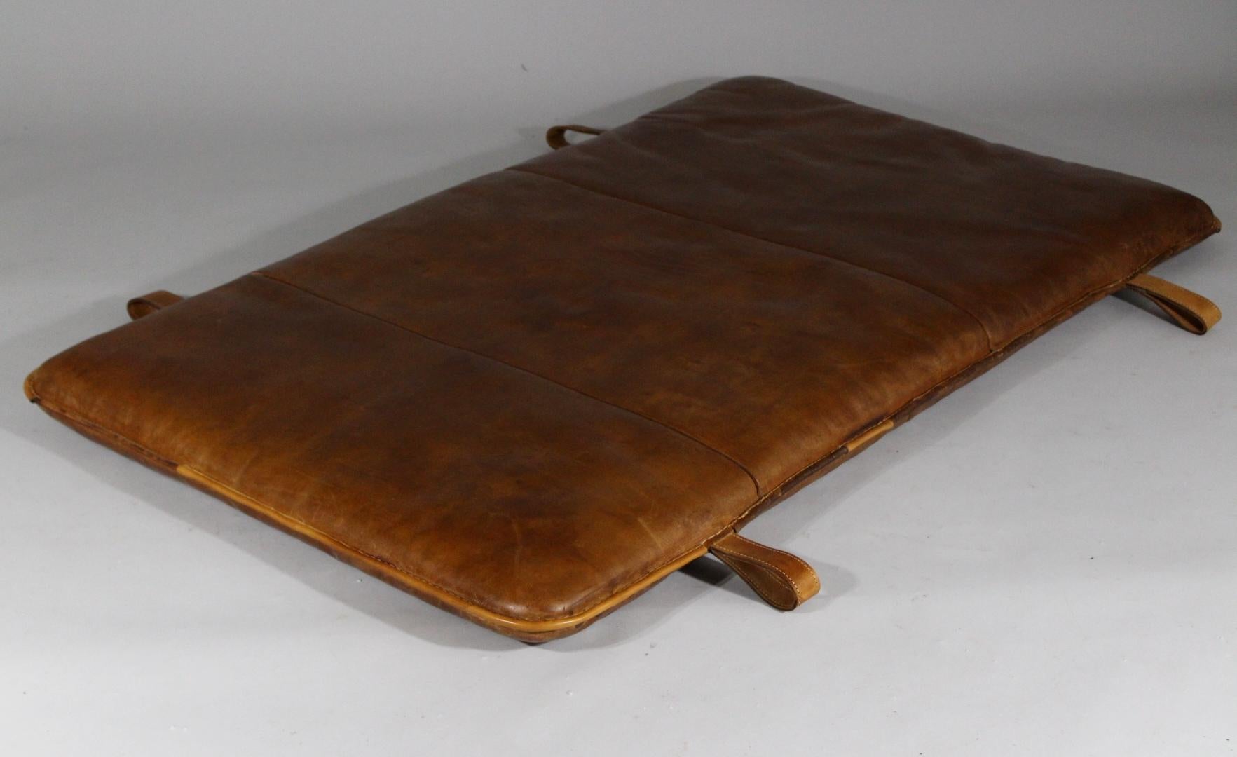 Leather gym mat from the 1930s. It has been made from a thick leather, good condition with patina.