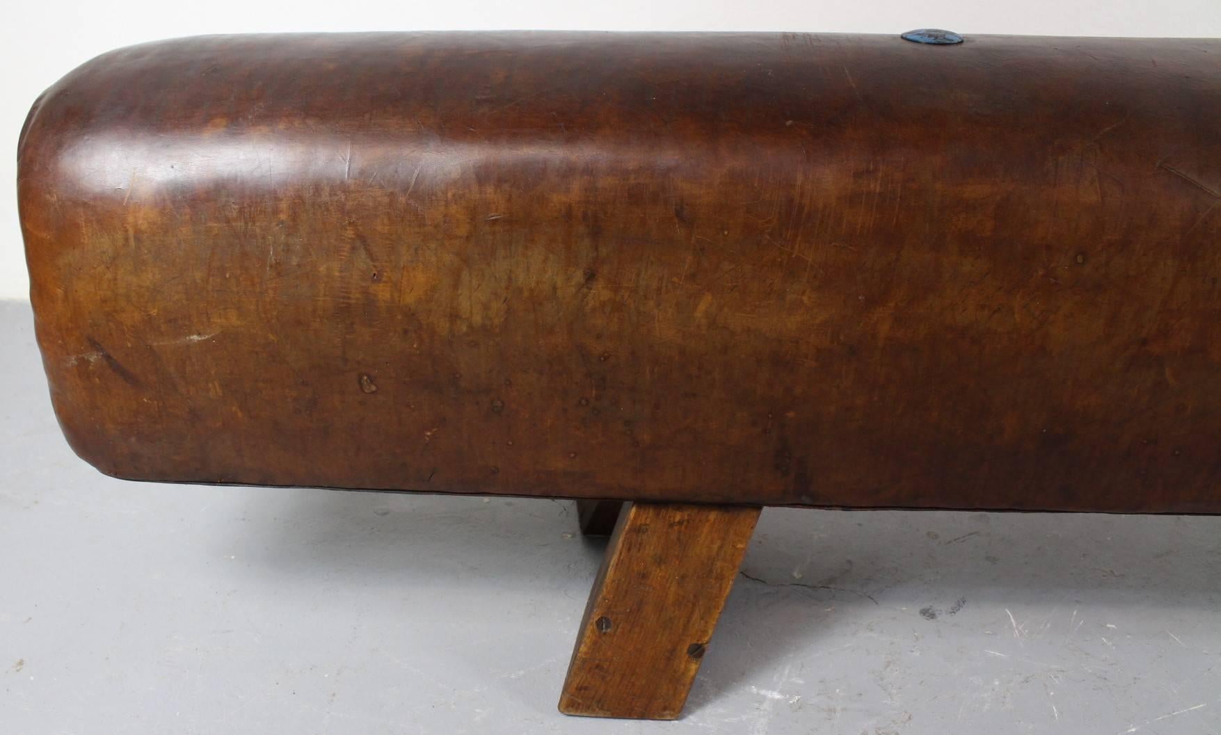 Leather gym pommel horse from the 1930s. It is in good original condition.