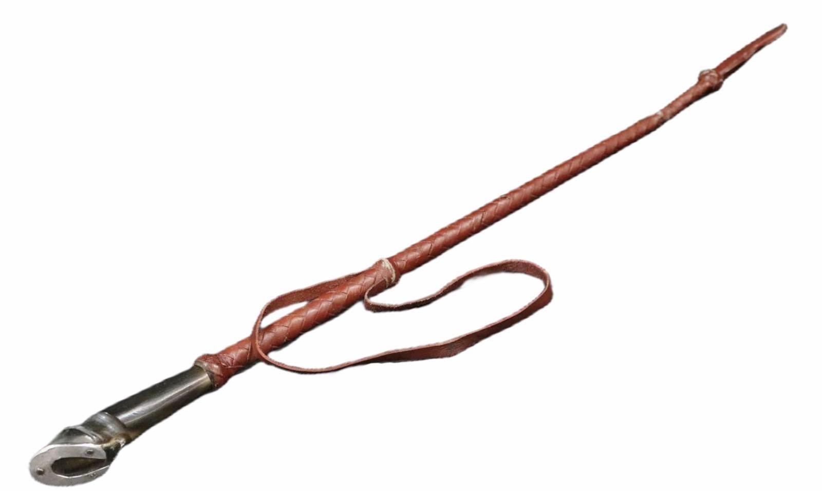 English riding crop wrapped in rope leather and whip stitched leather and hoof horn handle. Use lanes and a nail at the horseshoe missing. A used item but still in nice condition and usable.