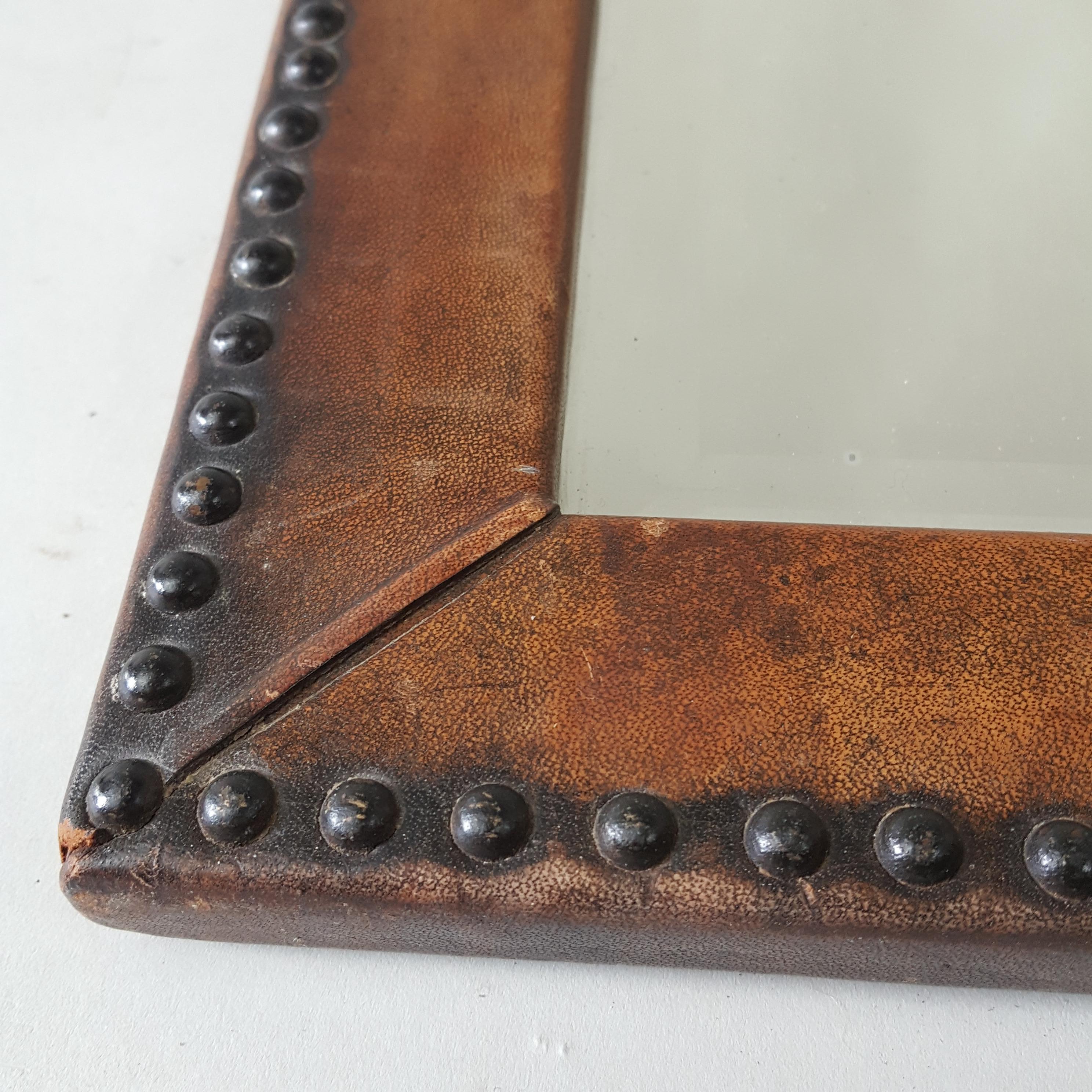 Arts and Crafts 1930's Leather studded frame arched mirror For Sale