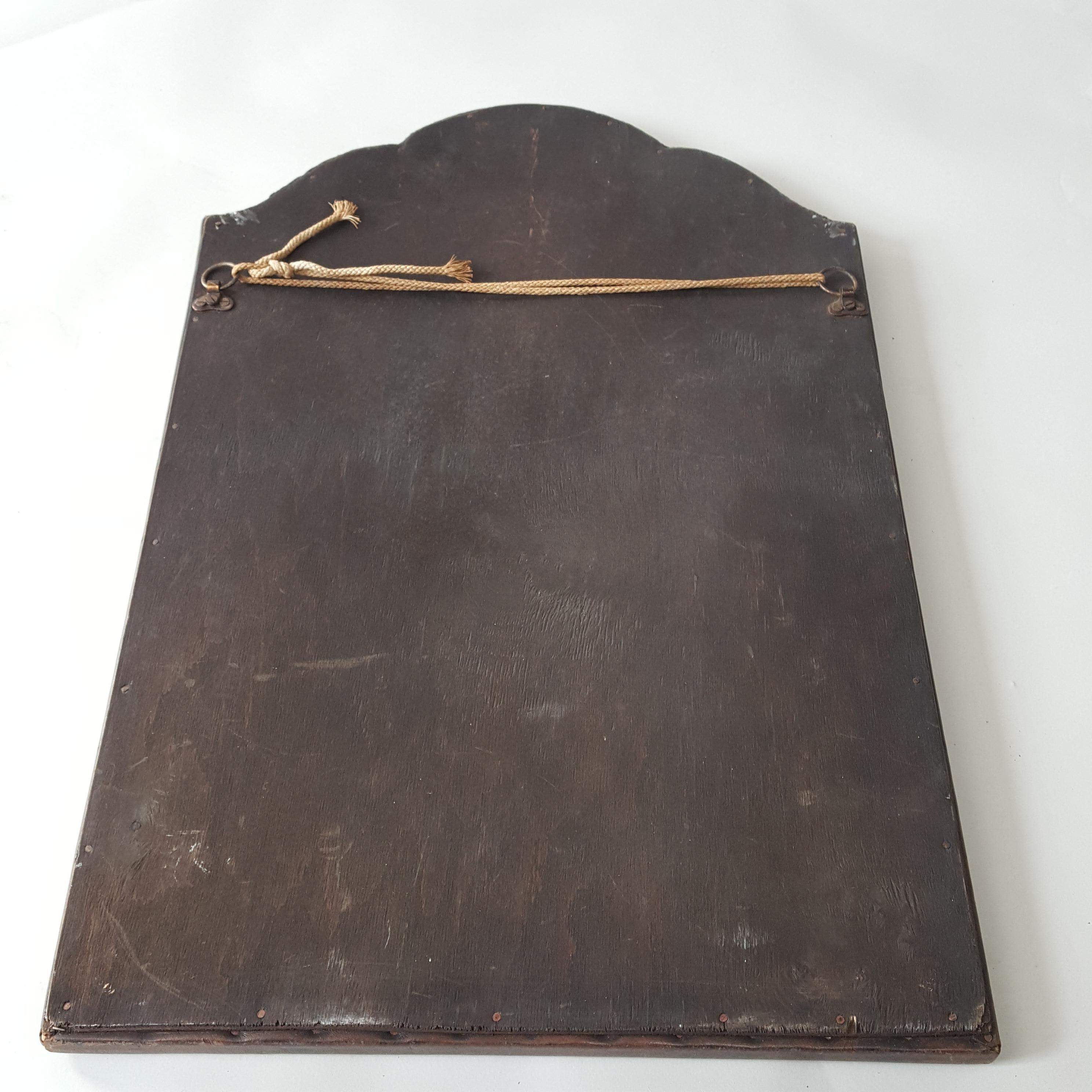 Hand-Crafted 1930's Leather studded frame arched mirror For Sale