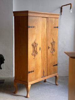 1930s linen press cabinet in elm and wrought iron details by danish cabinetmaker
