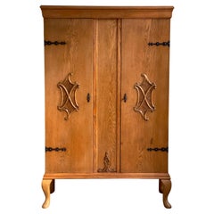 1930s linen press cabinet in elm and wrought iron details by danish cabinetmaker