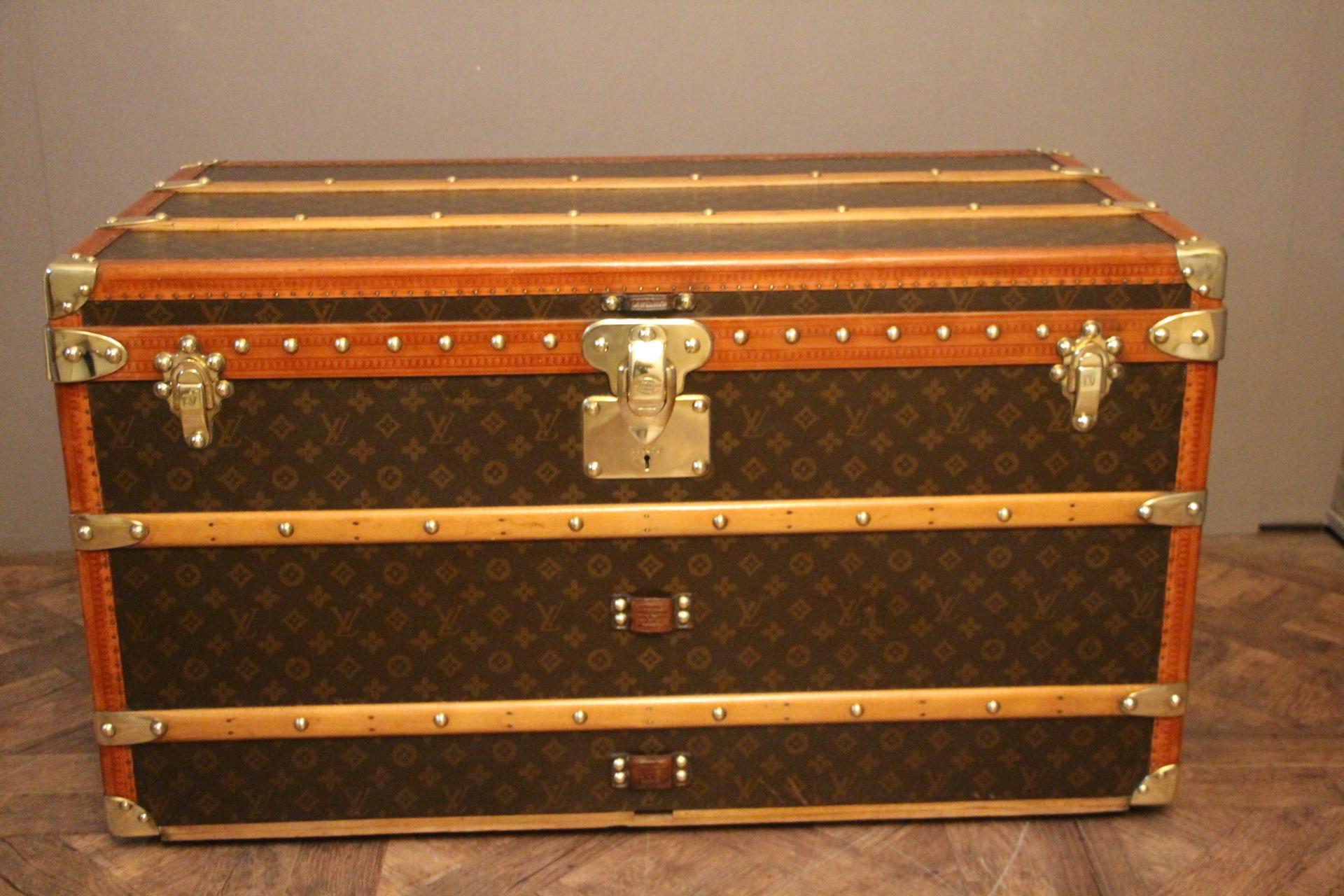 This superb Louis Vuitton steamer trunk features stenciled monogram canvas, lozine trim, LV stamped solid brass locks and studs as well as leather side handles and brass corners. It has got a beautiful original patina and is very