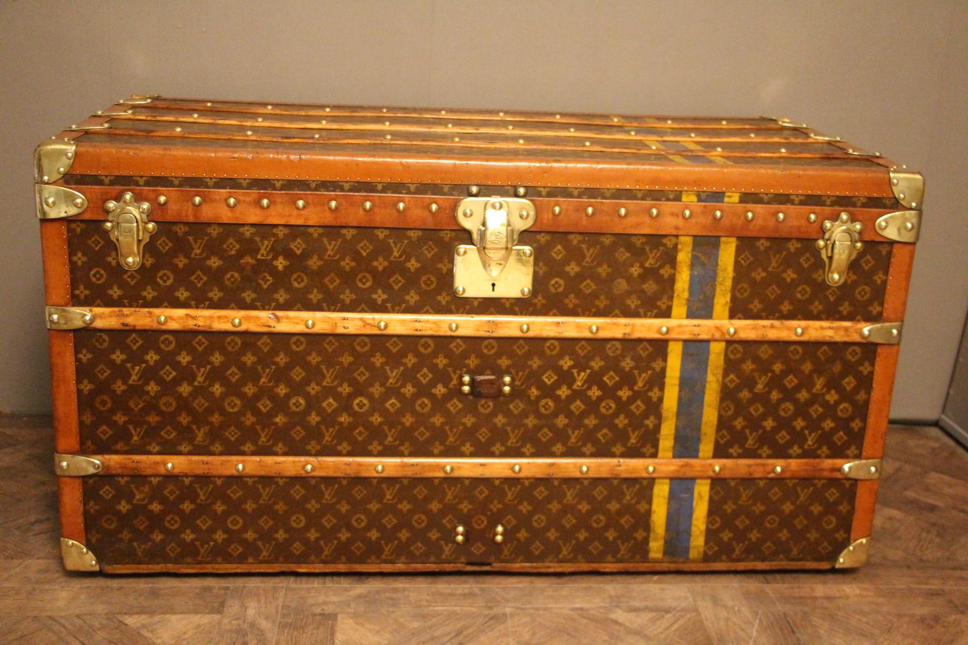 This superb Louis Vuitton steamer trunk features stenciled monogram canvas, lozine trim, LV stamped solid brass locks and studs as well as leather side handles and brass corners. It has got a beautiful original patina and is very elegant.
Blue and