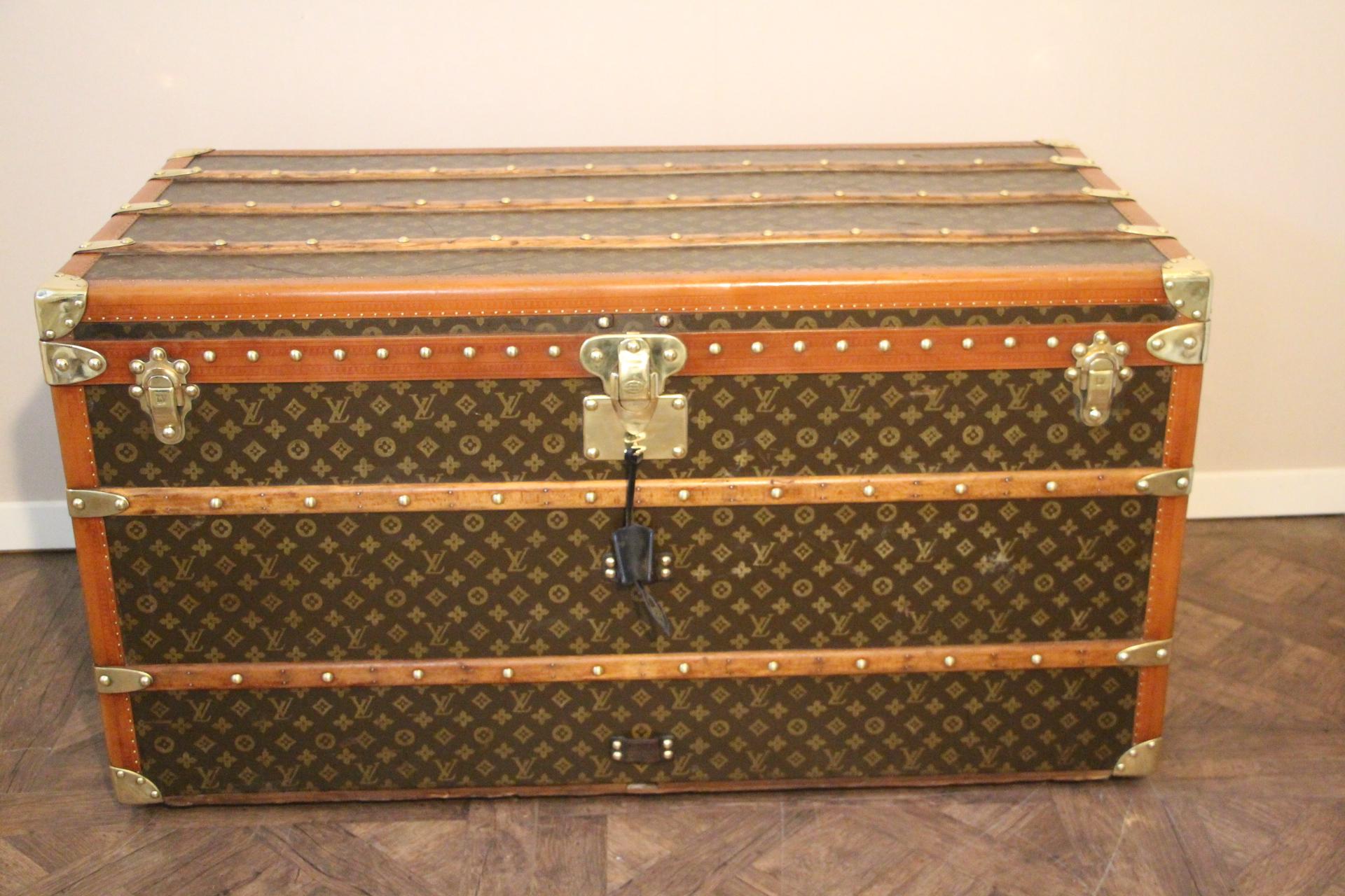 Beautiful Louis Vuitton steamer trunk featuring stenciled canvas, all honey color lozine trim, solid brass Louis Vuitton stamped clasps and lock, solid brass corners and large leather side handles.
Customizes painted stripes on its sides. Very warm