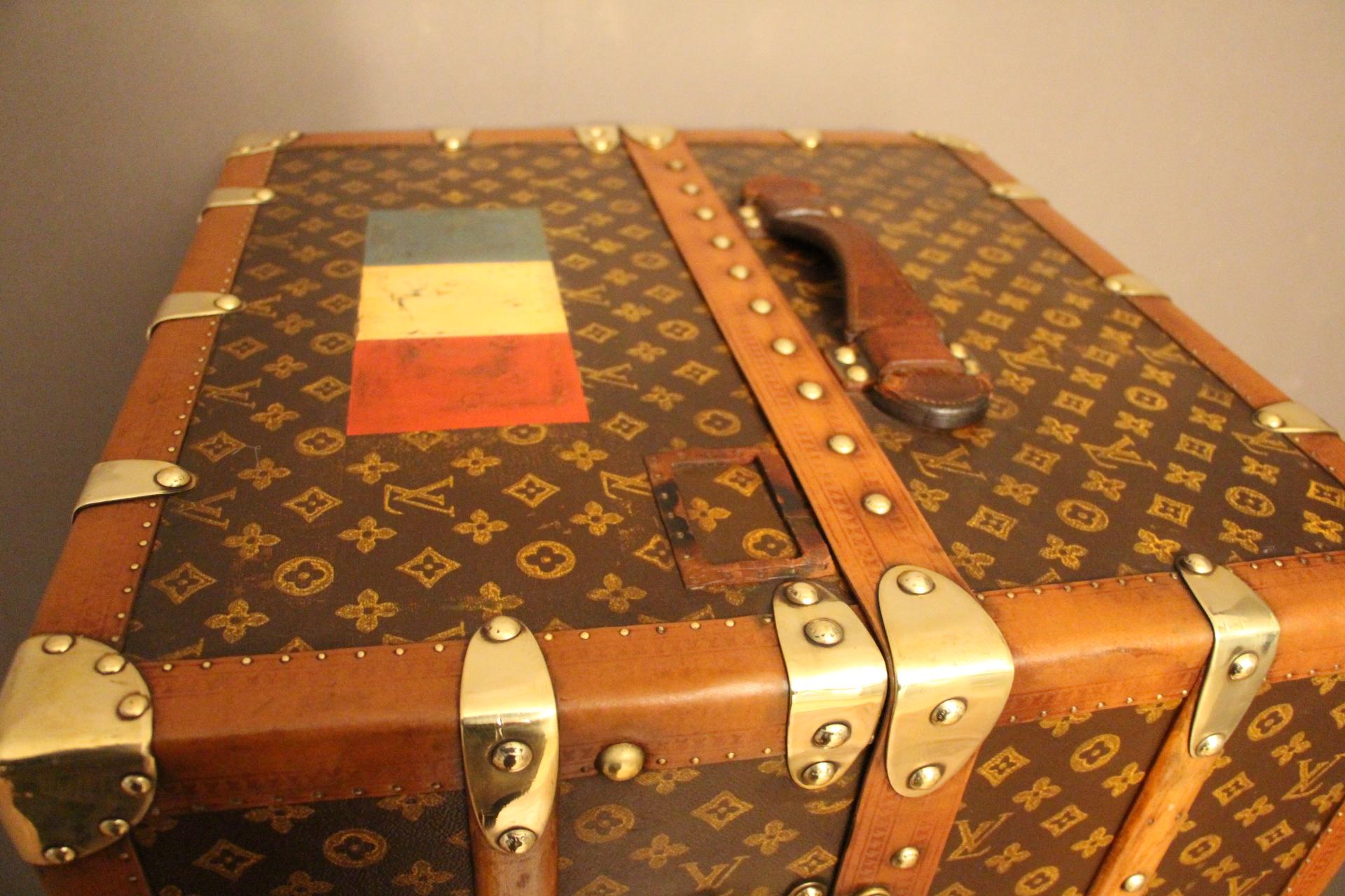 This impressive Louis Vuitton wardrobe features stenciled monogram canvas, lozine trims and solid brass locks.
Locks and studs are all marked Louis Vuitton. Customised French flag on the top.
Its interior is complete with a lot of original