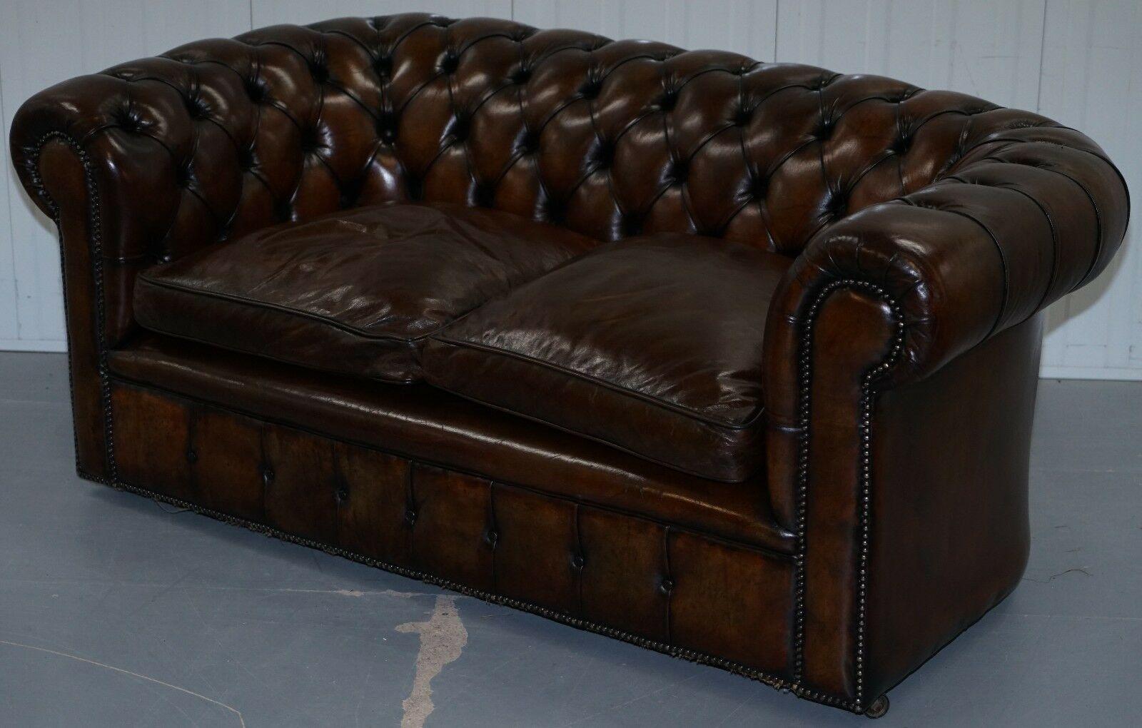 We are delighted to offer for sale this exceptionally rare original 1930s cigar brown leather Chesterfield club sofa in newly restored condition with feather filled cushions.

A really very rare find, you almost never come across early 20th