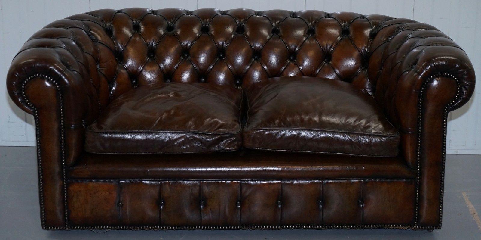 We are delighted to offer for sale this exceptionally rare original 1930s cigar brown leather Chesterfield club sofa in newly restored condition with feather filled cushions 

A really very rare find, you almost never come across early 20th