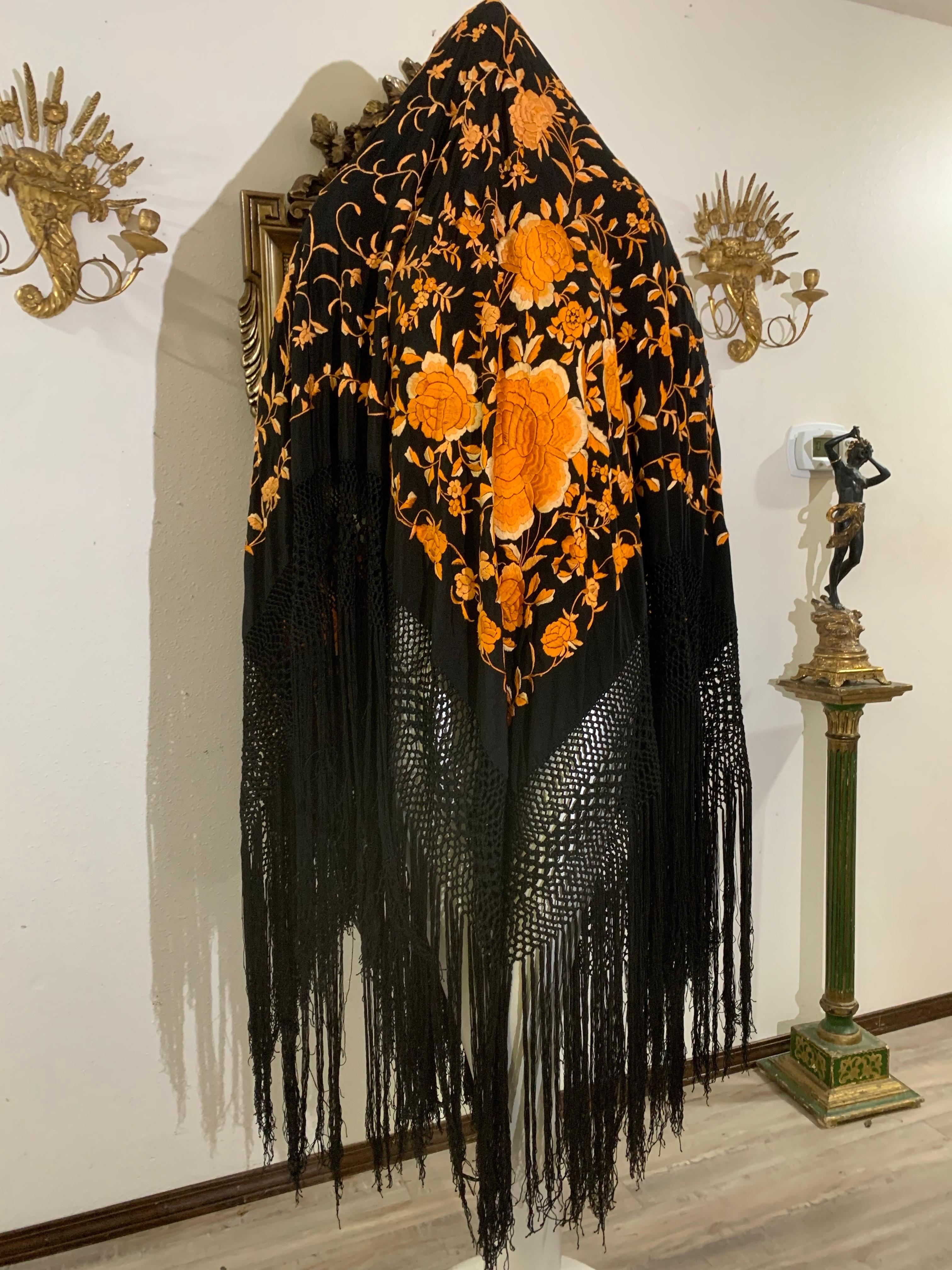 1930s Marigold Cabbage Rose Embroidered Black Silk Piano Shawl with Long Hand-Knotted Fringe All Around:  Very large and in excellent condition. Antique hand-embroidered from China, most likely.