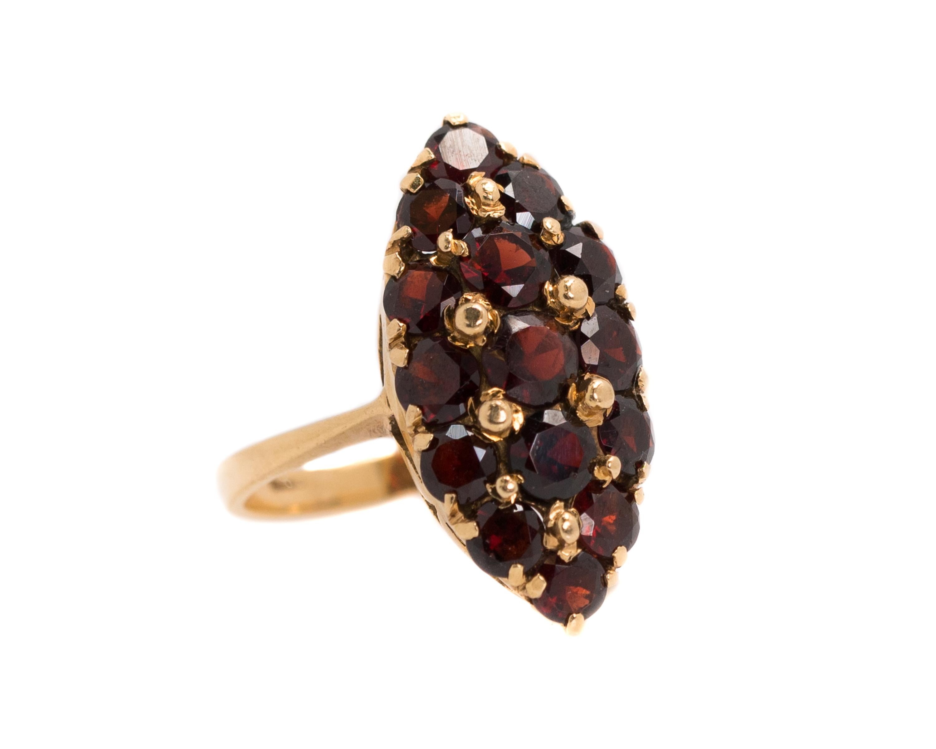 1930s Art Deco Marquise Garnet Navette Ring - 18 Karat Yellow Gold, Garnets

Navette, meaning little ship, is a ring style that was very popular during the Victorian era and beyond. The design has a marquise shape. It is widest at the middle,