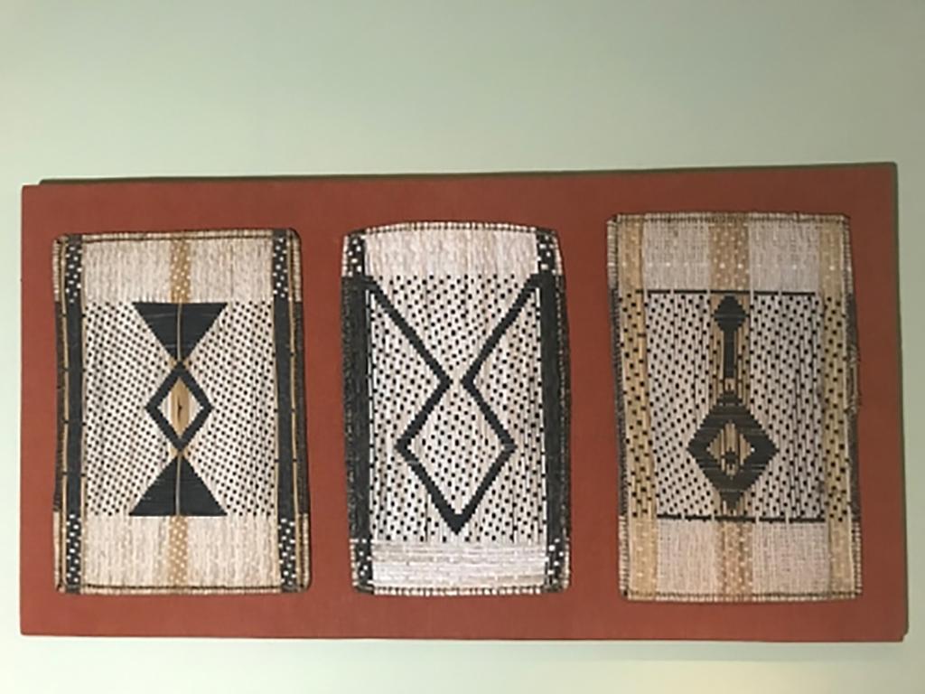 Woven panels such as this would have decorated the walls of a traditional Mbole meeting house in the Democratic Republic of the Congo. These woven decorative Mbole panels are made from woven bark fibre decorated with striking geometric designs. The