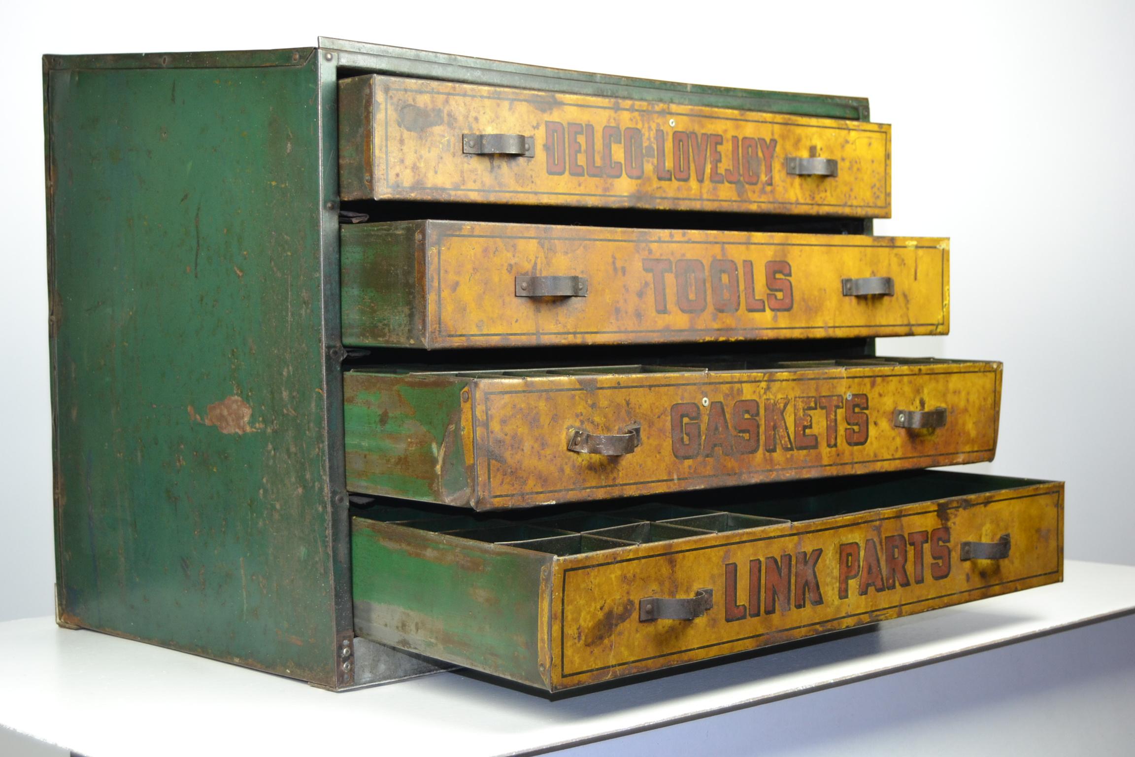 Great Antique Vintage English Garage Toolbox Cabinet. 
Heavy Metal Garage Organizer - Craftsman Tool Box - Garage Storage Cabinet - Garage Tool Box -  Tool Cabinet -Tool display. 
It has four drawers and the lettering is still on.  
Awesome great