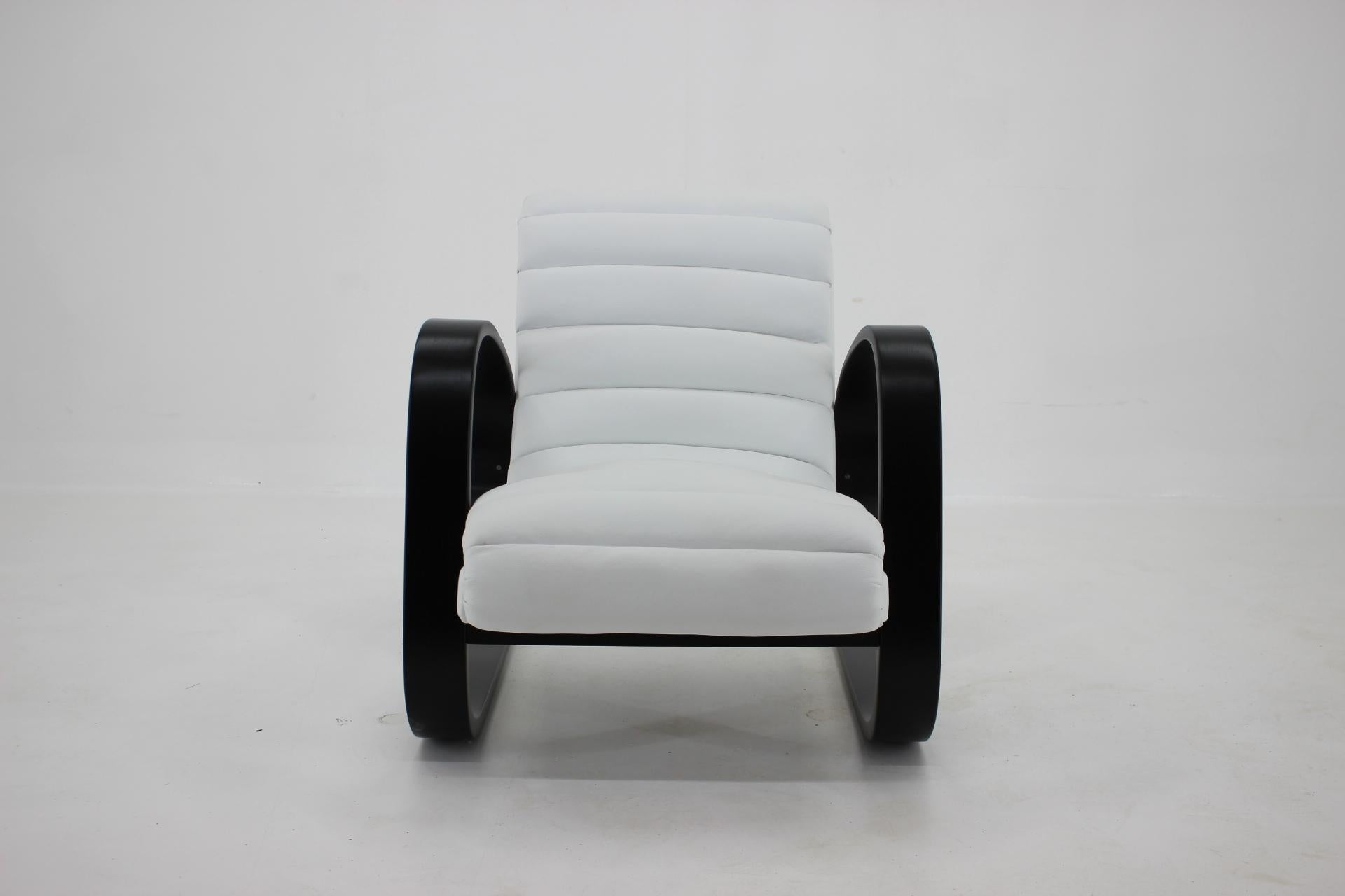 - Newly upholstered in white leather 
- Wooden parts have been lacquered in black mat finish.